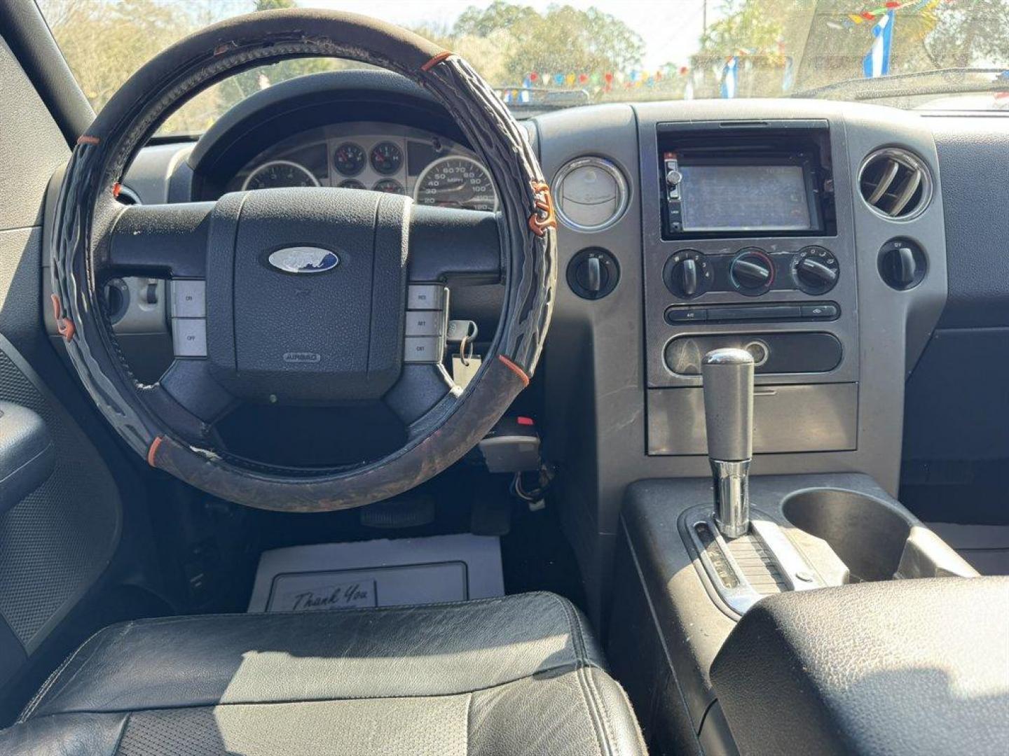 2005 Black /Black Ford F150 (1FTPW14535K) with an 5.4l V8 EFI Sohc 5.4l engine, Automatic transmission, located at 745 East Steele Rd., West Columbia, SC, 29170, (803) 755-9148, 33.927212, -81.148483 - Photo#6