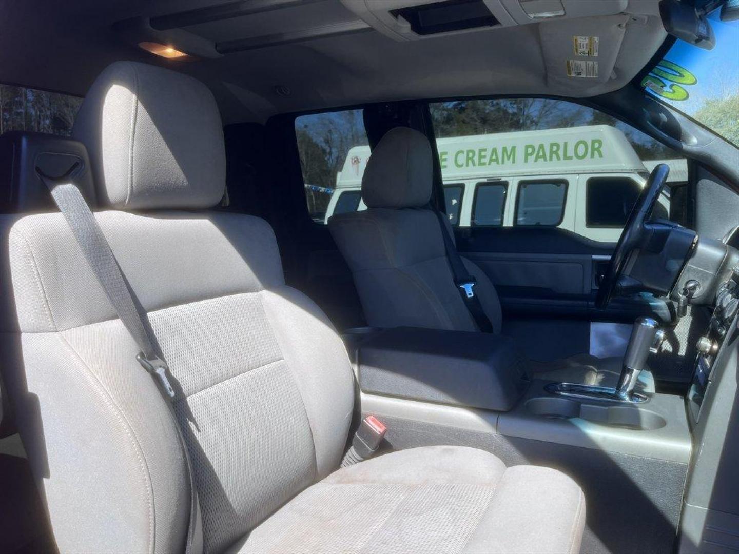 2005 Red /Grey Ford F150 (1FTPX14525N) with an 5.4l V8 EFI Sohc 5.4l engine, Automatic transmission, located at 745 East Steele Rd., West Columbia, SC, 29170, (803) 755-9148, 33.927212, -81.148483 - Special Internet Price! 2005 Ford F150 with AM/FM radio, Cruise control, Cloth interior, Manual air conditioning, 4X4, Powered windows, Powered door locks, Plus more! - Photo#27