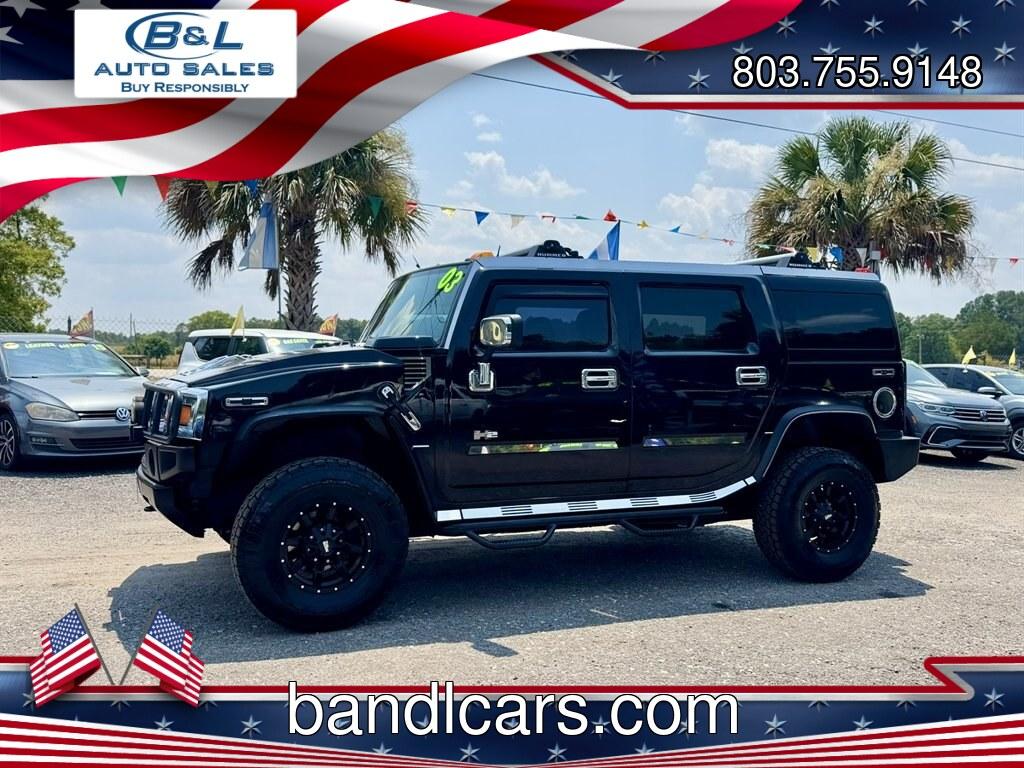 2003 Black /Black Hummer H2 (5GRGN23U53H) with an 6.0l V8 SFI 6.0l engine, Automatic transmission, located at 745 East Steele Rd., West Columbia, SC, 29170, (803) 755-9148, 33.927212, -81.148483- Photo#0