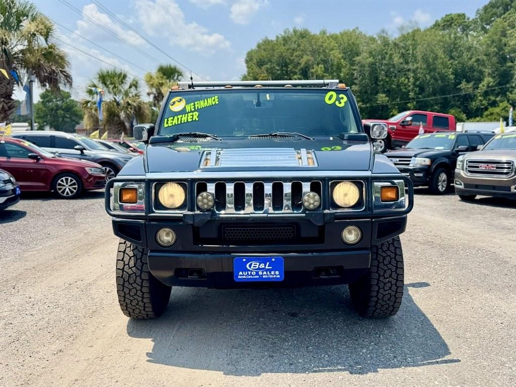 2003 Black /Black Hummer H2 (5GRGN23U53H) with an 6.0l V8 SFI 6.0l engine, Automatic transmission, located at 745 East Steele Rd., West Columbia, SC, 29170, (803) 755-9148, 33.927212, -81.148483- Photo#1