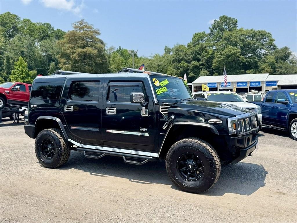 2003 Black /Black Hummer H2 (5GRGN23U53H) with an 6.0l V8 SFI 6.0l engine, Automatic transmission, located at 745 East Steele Rd., West Columbia, SC, 29170, (803) 755-9148, 33.927212, -81.148483- Photo#2