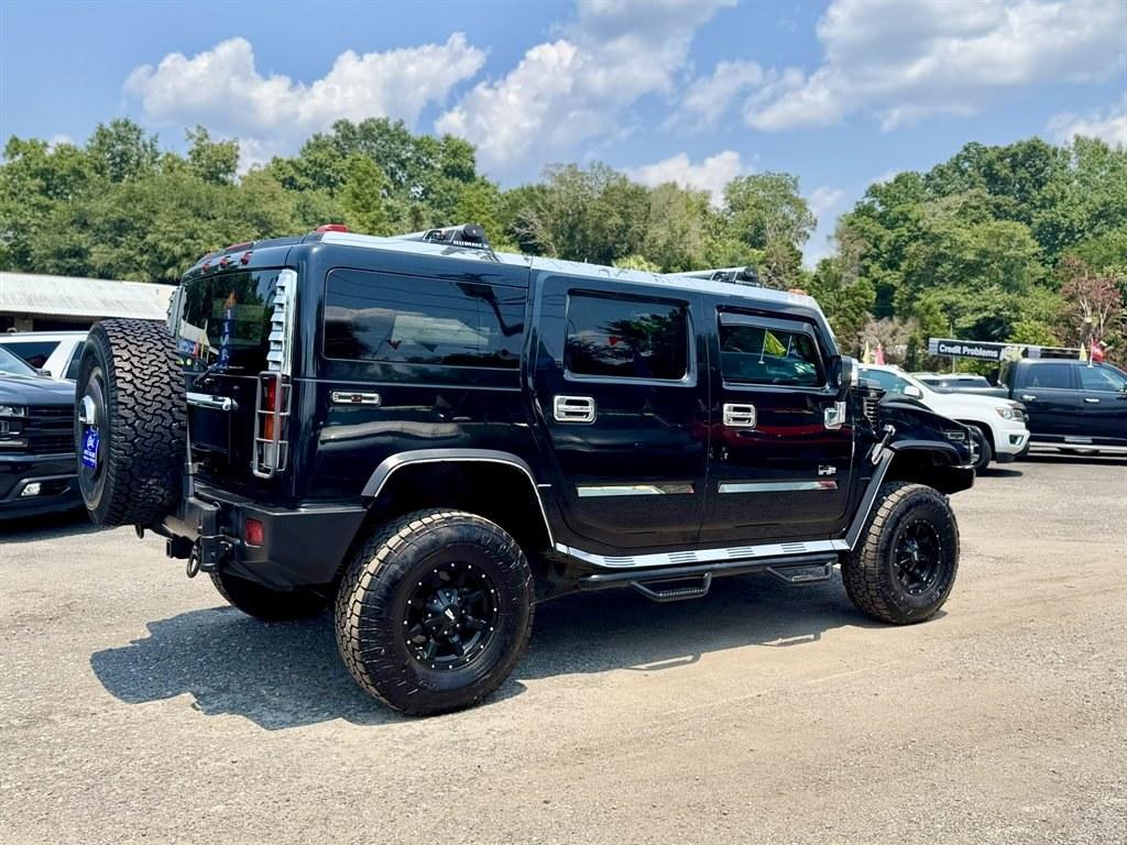 2003 Black /Black Hummer H2 (5GRGN23U53H) with an 6.0l V8 SFI 6.0l engine, Automatic transmission, located at 745 East Steele Rd., West Columbia, SC, 29170, (803) 755-9148, 33.927212, -81.148483- Photo#3
