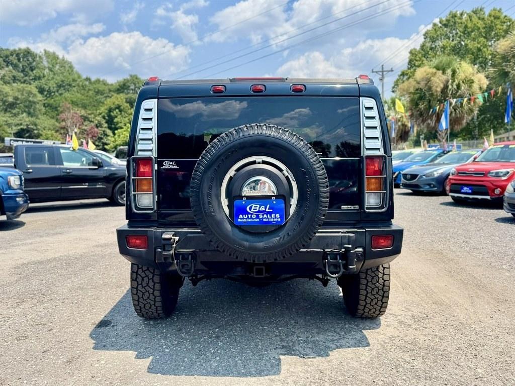 2003 Black /Black Hummer H2 (5GRGN23U53H) with an 6.0l V8 SFI 6.0l engine, Automatic transmission, located at 745 East Steele Rd., West Columbia, SC, 29170, (803) 755-9148, 33.927212, -81.148483- Photo#4