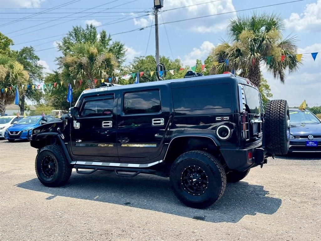 2003 Black /Black Hummer H2 (5GRGN23U53H) with an 6.0l V8 SFI 6.0l engine, Automatic transmission, located at 745 East Steele Rd., West Columbia, SC, 29170, (803) 755-9148, 33.927212, -81.148483- Photo#5