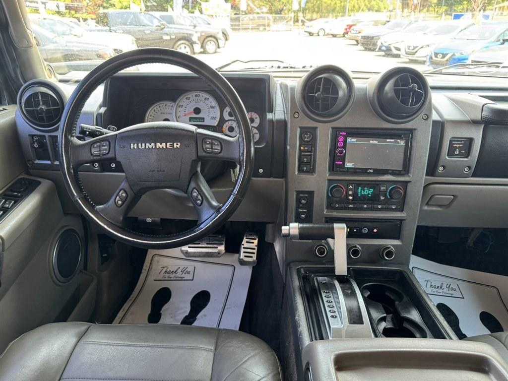 2003 Black /Black Hummer H2 (5GRGN23U53H) with an 6.0l V8 SFI 6.0l engine, Automatic transmission, located at 745 East Steele Rd., West Columbia, SC, 29170, (803) 755-9148, 33.927212, -81.148483- Photo#6