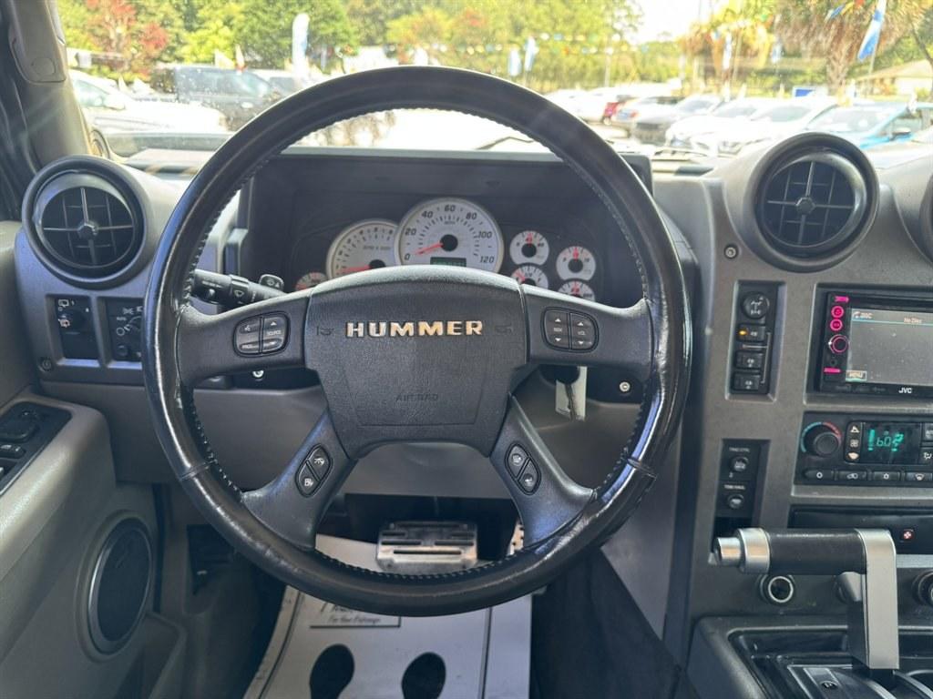 2003 Black /Black Hummer H2 (5GRGN23U53H) with an 6.0l V8 SFI 6.0l engine, Automatic transmission, located at 745 East Steele Rd., West Columbia, SC, 29170, (803) 755-9148, 33.927212, -81.148483- Photo#7