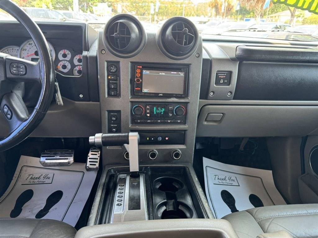 2003 Black /Black Hummer H2 (5GRGN23U53H) with an 6.0l V8 SFI 6.0l engine, Automatic transmission, located at 745 East Steele Rd., West Columbia, SC, 29170, (803) 755-9148, 33.927212, -81.148483- Photo#11