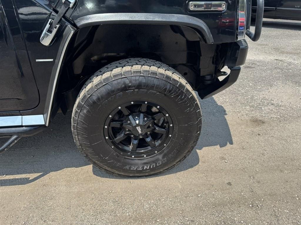 2003 Black /Black Hummer H2 (5GRGN23U53H) with an 6.0l V8 SFI 6.0l engine, Automatic transmission, located at 745 East Steele Rd., West Columbia, SC, 29170, (803) 755-9148, 33.927212, -81.148483- Photo#28