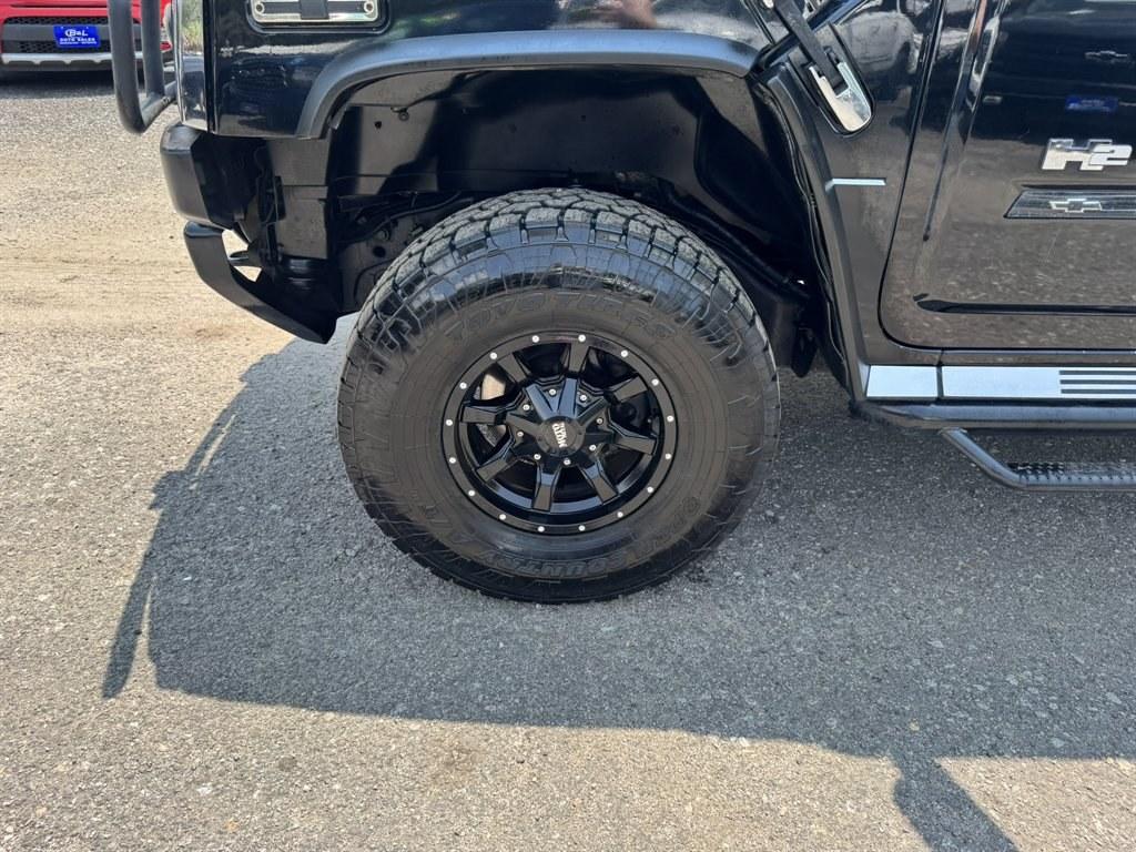 2003 Black /Black Hummer H2 (5GRGN23U53H) with an 6.0l V8 SFI 6.0l engine, Automatic transmission, located at 745 East Steele Rd., West Columbia, SC, 29170, (803) 755-9148, 33.927212, -81.148483- Photo#31