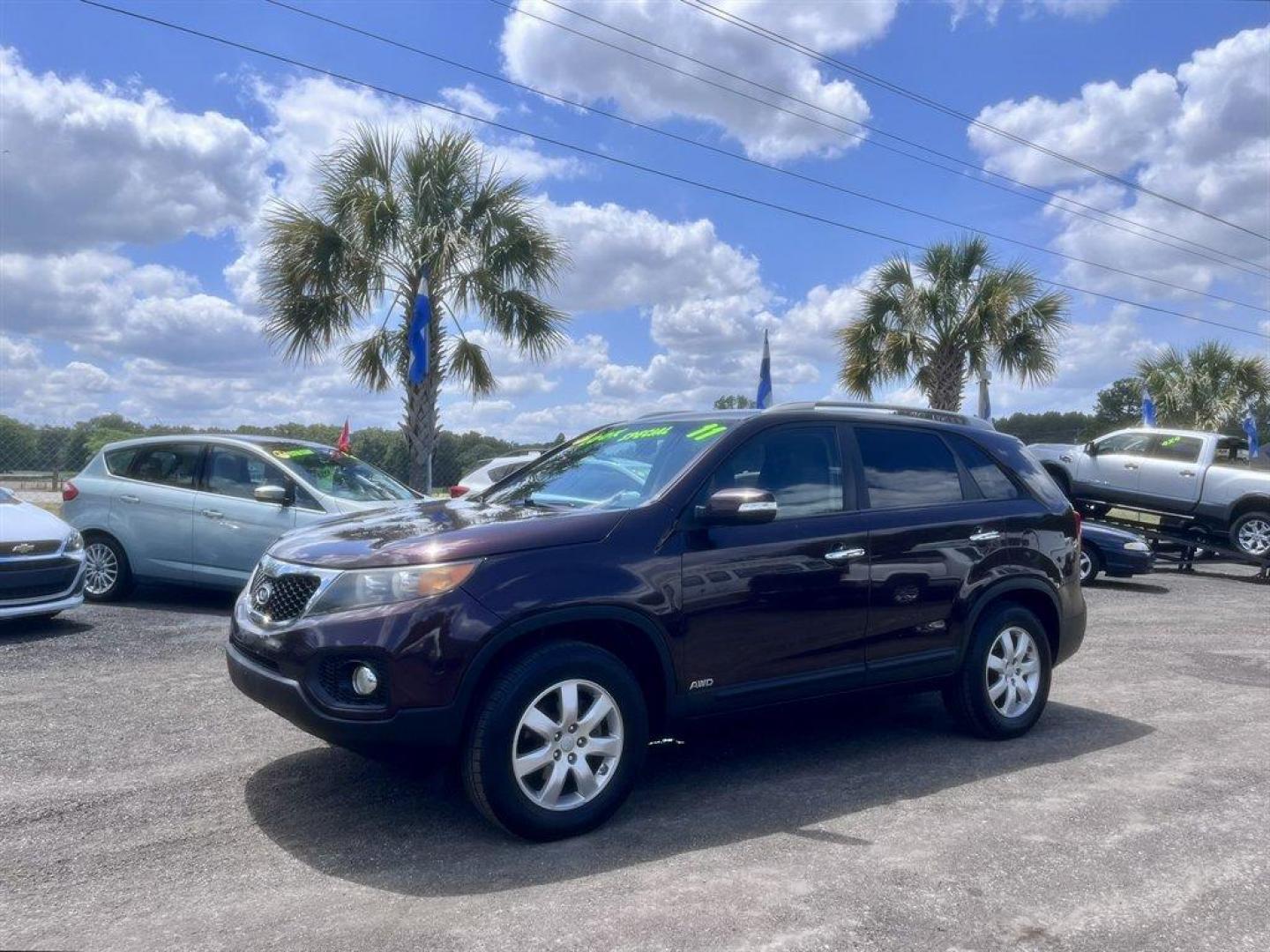 2011 Burgundy /Grey Kia Sorento (5XYKTCA10BG) with an 2.4l I-4 MPI Dohc Cvvt 2. engine, Automatic transmission, located at 745 East Steele Rd., West Columbia, SC, 29170, (803) 755-9148, 33.927212, -81.148483 - Special Internet Price! 2011 Kia Sorento - Photo#0