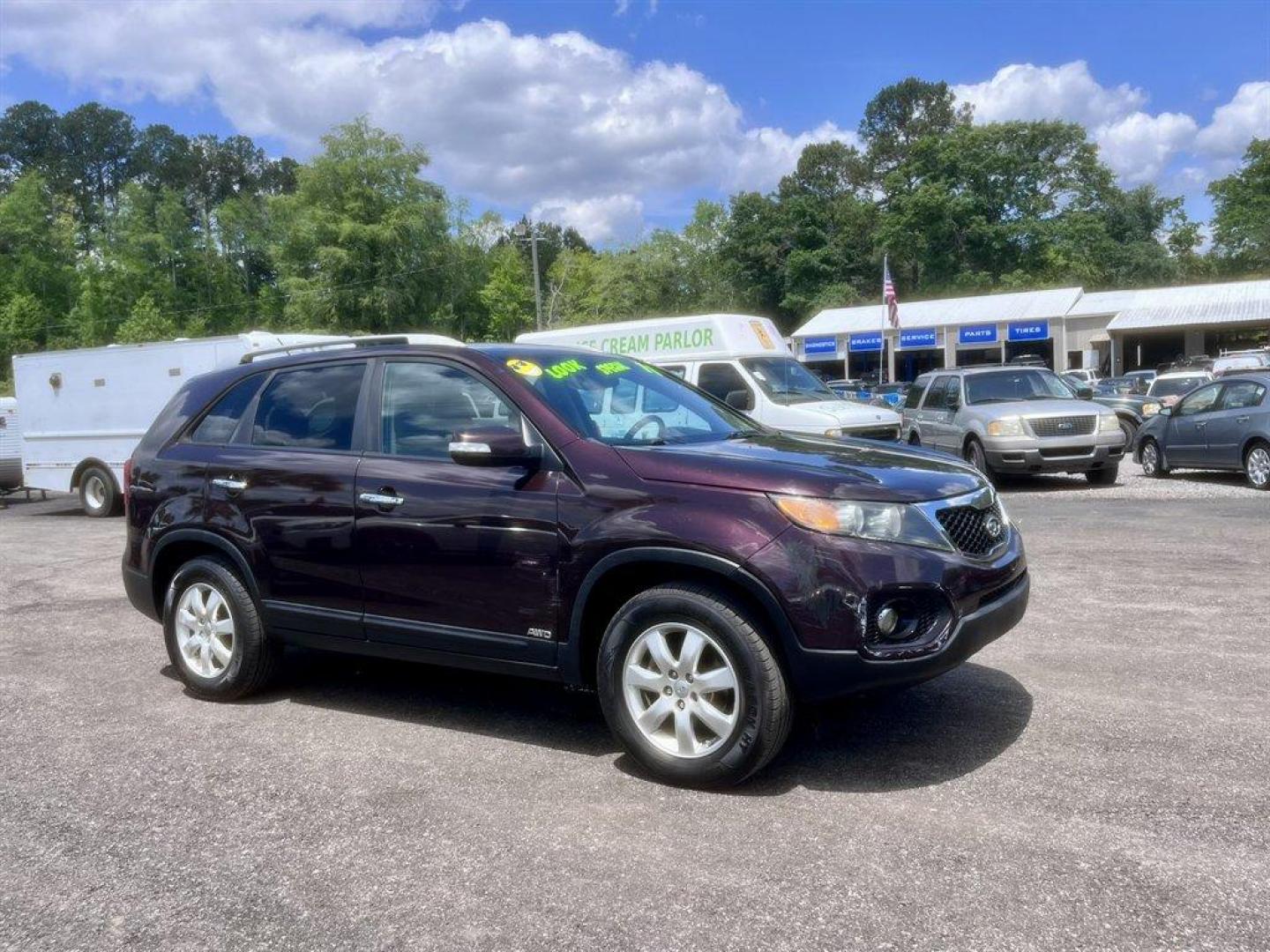 2011 Burgundy /Grey Kia Sorento (5XYKTCA10BG) with an 2.4l I-4 MPI Dohc Cvvt 2. engine, Automatic transmission, located at 745 East Steele Rd., West Columbia, SC, 29170, (803) 755-9148, 33.927212, -81.148483 - Special Internet Price! 2011 Kia Sorento - Photo#2