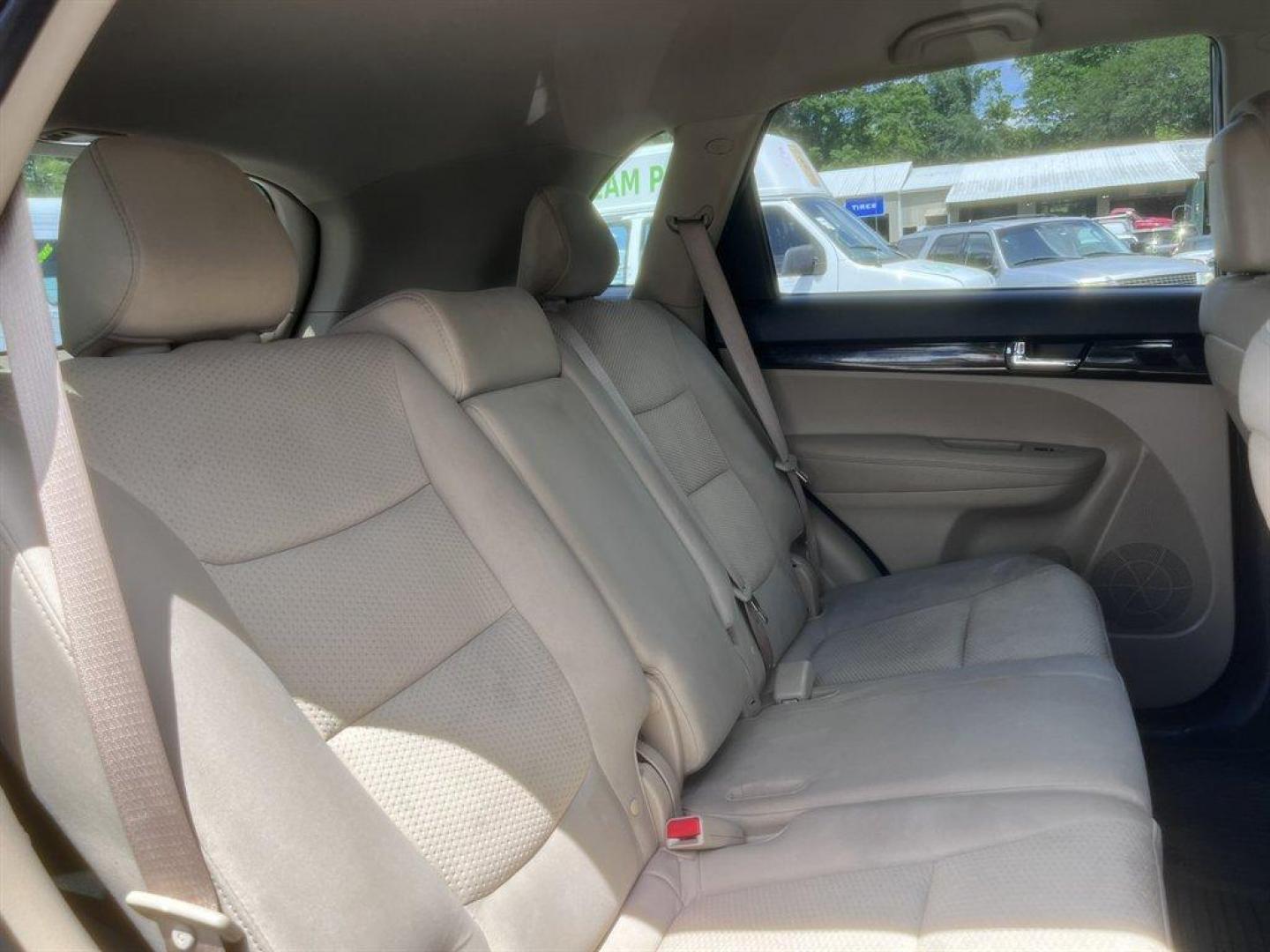 2011 Burgundy /Grey Kia Sorento (5XYKTCA10BG) with an 2.4l I-4 MPI Dohc Cvvt 2. engine, Automatic transmission, located at 745 East Steele Rd., West Columbia, SC, 29170, (803) 755-9148, 33.927212, -81.148483 - Special Internet Price! 2011 Kia Sorento - Photo#23