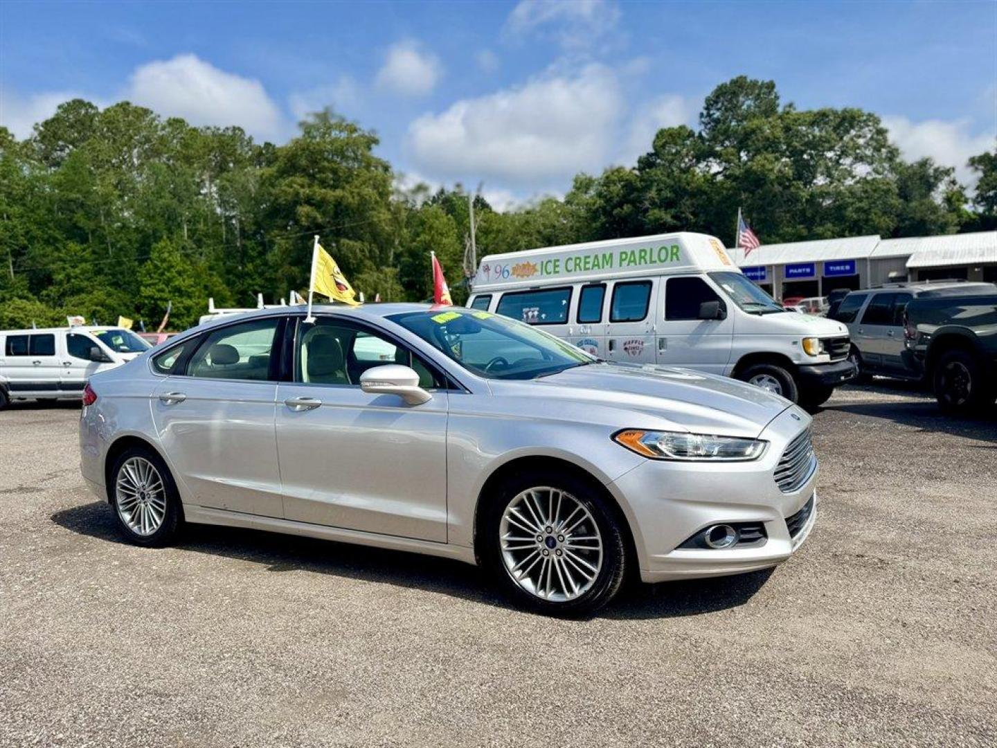 2014 Silver /Taupe Ford Fusion (3FA6P0HD5ER) with an 1.5l I-4 DI Dohc Ecoboost engine, Automatic transmission, located at 745 East Steele Rd., West Columbia, SC, 29170, (803) 755-9148, 33.927212, -81.148483 - Special Internet Price! 2014 Ford Fusion with AM/FM radio, Bluetooth, Backup camera, Navigation, Leather interior, Keyless entry, Sunroof, Powered windows, Powered door locks, Plus more! - Photo#2