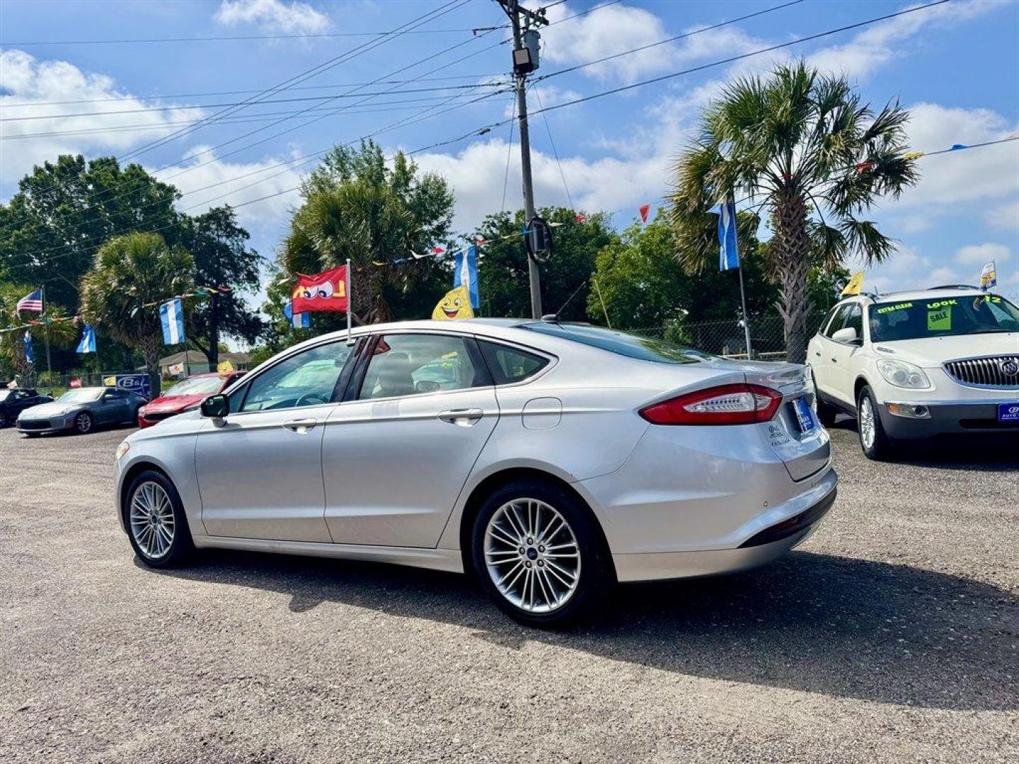 2014 Silver /Taupe Ford Fusion (3FA6P0HD5ER) with an 1.5l I-4 DI Dohc Ecoboost engine, Automatic transmission, located at 745 East Steele Rd., West Columbia, SC, 29170, (803) 755-9148, 33.927212, -81.148483 - Special Internet Price! 2014 Ford Fusion with AM/FM radio, Bluetooth, Backup camera, Navigation, Leather interior, Keyless entry, Sunroof, Powered windows, Powered door locks, Plus more! - Photo#5
