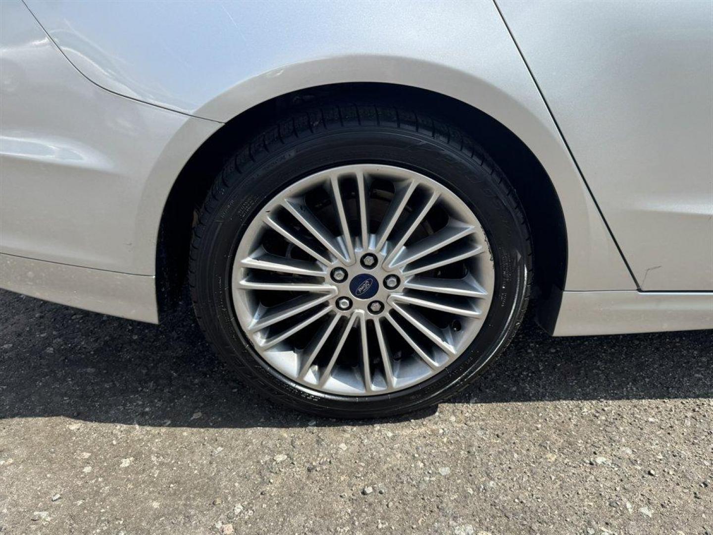 2014 Silver /Taupe Ford Fusion (3FA6P0HD5ER) with an 1.5l I-4 DI Dohc Ecoboost engine, Automatic transmission, located at 745 East Steele Rd., West Columbia, SC, 29170, (803) 755-9148, 33.927212, -81.148483 - Special Internet Price! 2014 Ford Fusion with AM/FM radio, Bluetooth, Backup camera, Navigation, Leather interior, Keyless entry, Sunroof, Powered windows, Powered door locks, Plus more! - Photo#34