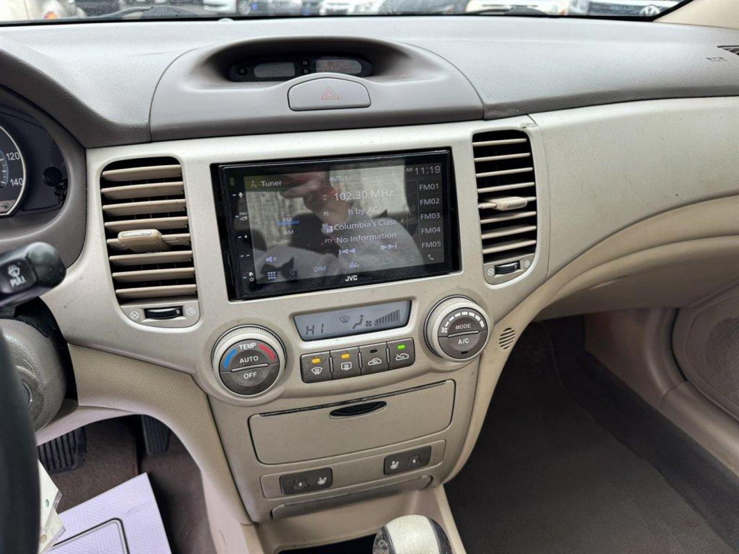 2008 White /Taupe Kia Optima (KNAGE124585) with an 2.7l V6 MPI Dohc 2.7l engine, Automatic transmission, located at 745 East Steele Rd., West Columbia, SC, 29170, (803) 755-9148, 33.927212, -81.148483 - Special Internet Price! 2008 Kia Optima - Photo#12