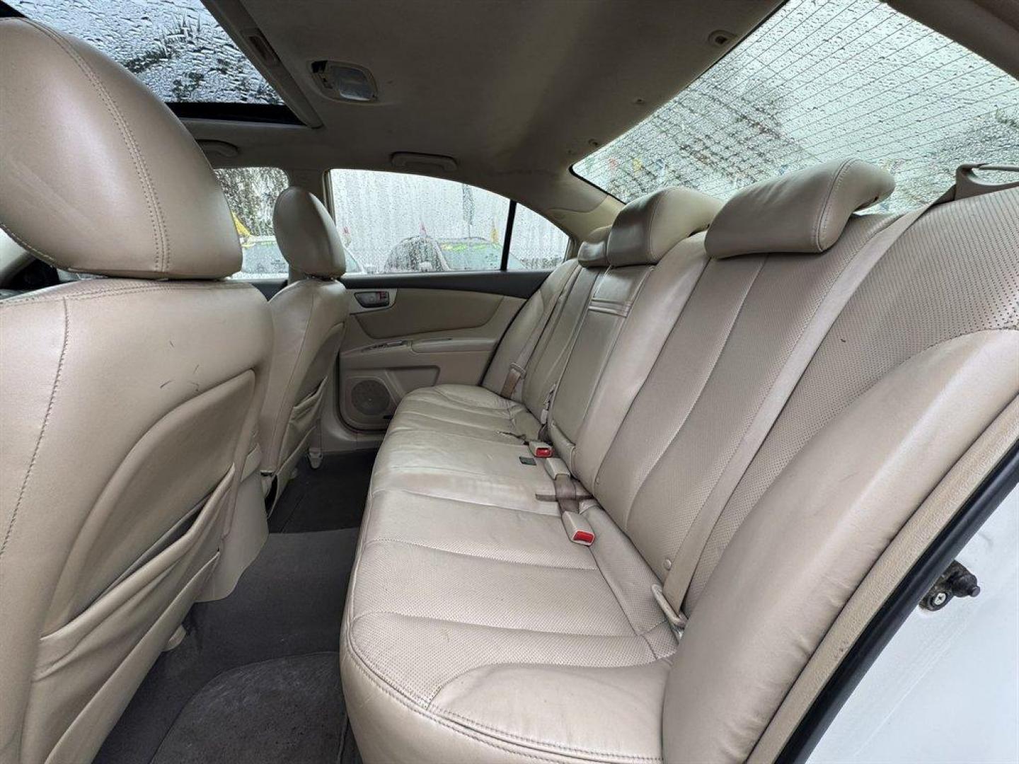 2008 White /Taupe Kia Optima (KNAGE124585) with an 2.7l V6 MPI Dohc 2.7l engine, Automatic transmission, located at 745 East Steele Rd., West Columbia, SC, 29170, (803) 755-9148, 33.927212, -81.148483 - Special Internet Price! 2008 Kia Optima - Photo#20