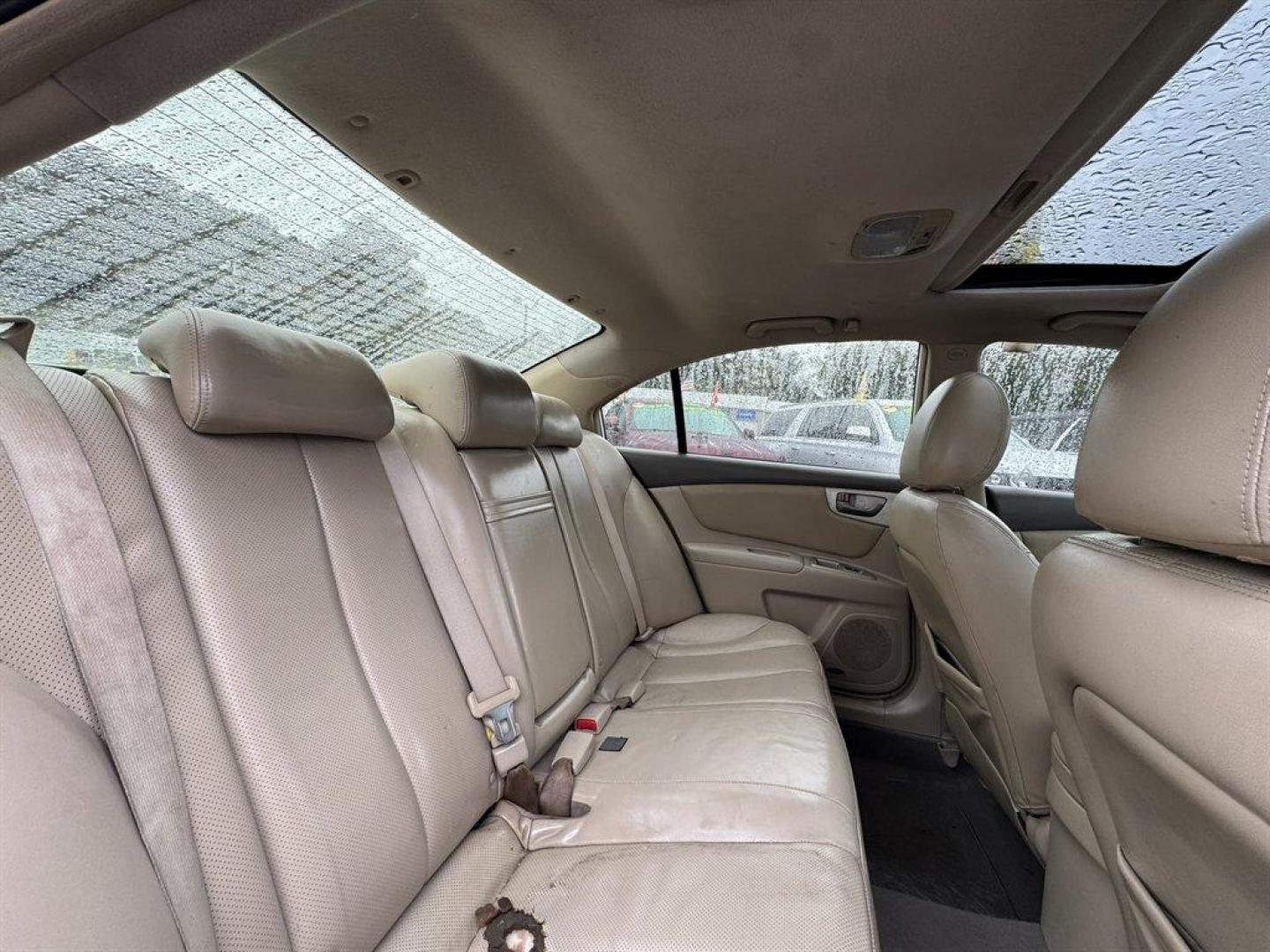 2008 White /Taupe Kia Optima (KNAGE124585) with an 2.7l V6 MPI Dohc 2.7l engine, Automatic transmission, located at 745 East Steele Rd., West Columbia, SC, 29170, (803) 755-9148, 33.927212, -81.148483 - Special Internet Price! 2008 Kia Optima - Photo#22