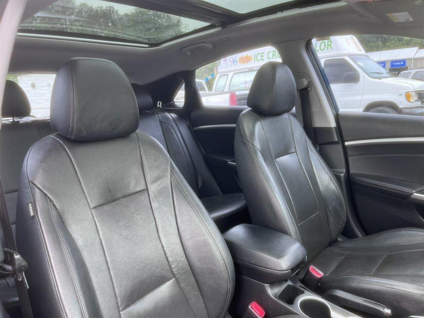 2014 Blue /Black Hyundai Elantra (KMHD35LHXEU) with an 2.0l I-4 DI Dohc Cvvt 2.0 engine, Automatic transmission, located at 745 East Steele Rd., West Columbia, SC, 29170, (803) 755-9148, 33.927212, -81.148483 - Special Internet Price! 2014 Hyundai Elantra with AM/FM radio, Backup camera, Bluetooth, Navigation, Sunroof, Cruise control, Leather interior, Powered windows, Powered door locks, Plus more! - Photo#27