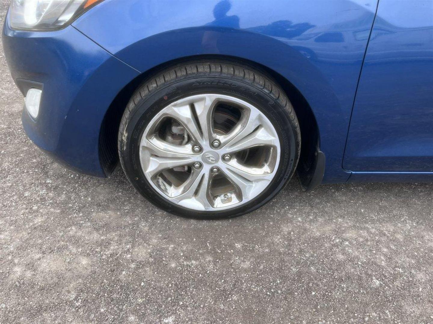 2014 Blue /Black Hyundai Elantra (KMHD35LHXEU) with an 2.0l I-4 DI Dohc Cvvt 2.0 engine, Automatic transmission, located at 745 East Steele Rd., West Columbia, SC, 29170, (803) 755-9148, 33.927212, -81.148483 - Special Internet Price! 2014 Hyundai Elantra with AM/FM radio, Backup camera, Bluetooth, Navigation, Sunroof, Cruise control, Leather interior, Powered windows, Powered door locks, Plus more! - Photo#32