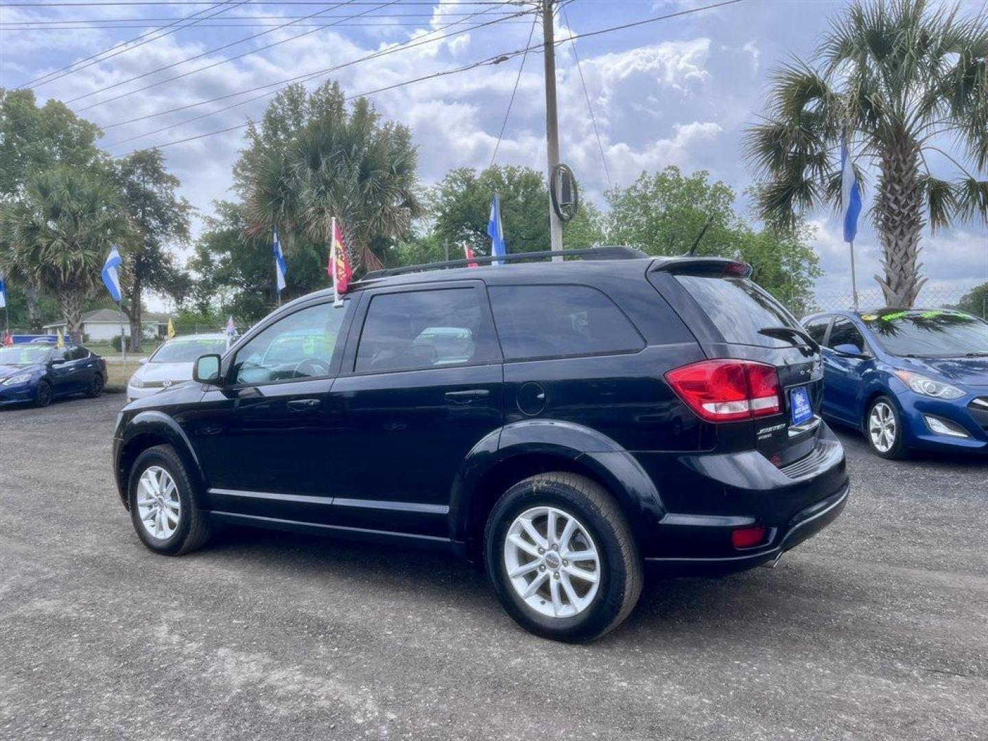 2015 Black /Black Dodge Journey (3C4PDDBG3FT) with an 3.6l V6 MPI Dohc VVT Flex engine, Automatic transmission, located at 745 East Steele Rd., West Columbia, SC, 29170, (803) 755-9148, 33.927212, -81.148483 - Special Internet Price! 2015 Dodge Journey with AM/FM radio, Cruise control, Backup camera, Sunroof, Cloth interior, Powered windows, Powered door locks, Plus more! - Photo#4