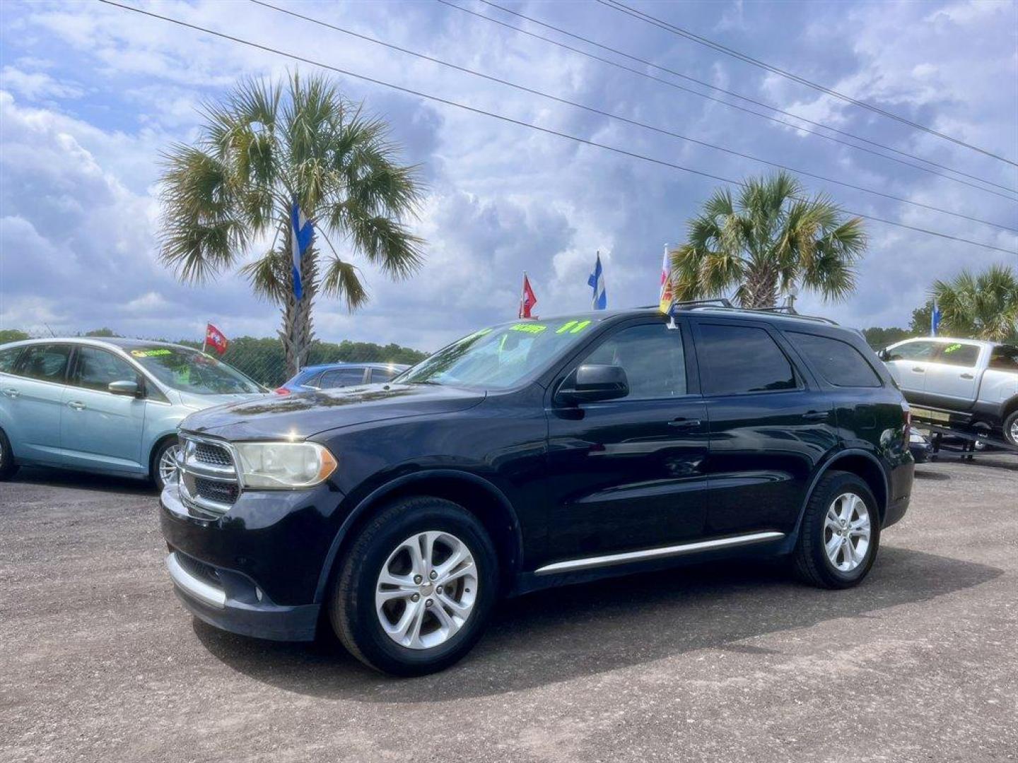 2011 Black /Black Dodge Durango (1D4RD2GG8BC) with an 3.6l V6 MPI Dohc 3.6l engine, Automatic transmission, located at 745 East Steele Rd., West Columbia, SC, 29170, (803) 755-9148, 33.927212, -81.148483 - Special Internet Price! 2011 Dodge Durango with AM/FM radio, Backup camera, Cruise control, 3rd row seating, Cloth interior, Powered windows, Powered door locks, Plus more! - Photo#0