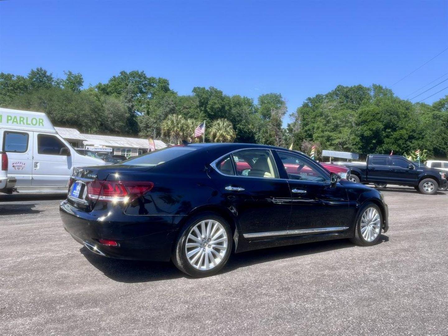2013 Black /Tan Lexus LS 460 (JTHBL5EF9D5) with an 4.6l V8 SFI Dohc VVT-I 4. engine, Automatic transmission, located at 745 East Steele Rd., West Columbia, SC, 29170, (803) 755-9148, 33.927212, -81.148483 - Special Internet Price! 2013 Lexus LS with AM/FM radio, Backup camera, Navigation, Sunroof, Push to start, Keyless entry, Powered front seats, Heating and cooling front seats, Leather interior, Powered windows, Powered door locks, Plus more! - Photo#3