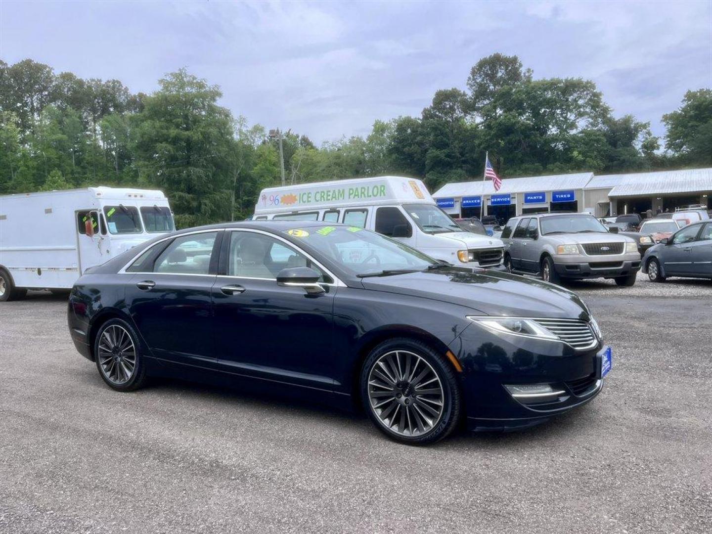 2014 Black /Taupe Lincoln MKZ (3LN6L2G93ER) with an 2.0l I-4 DI T/C Ecoboost engine, Automatic transmission, located at 745 East Steele Rd., West Columbia, SC, 29170, (803) 755-9148, 33.927212, -81.148483 - Special Internet Price! 2014 Lincoln MKZ with AM/FM radio, Bluetooth for phone, Navigation, Cruise control, Sunroof, Keyless entry, Push to start, Leather interior, Powered windows, Powered door locks, Plus more! - Photo#2