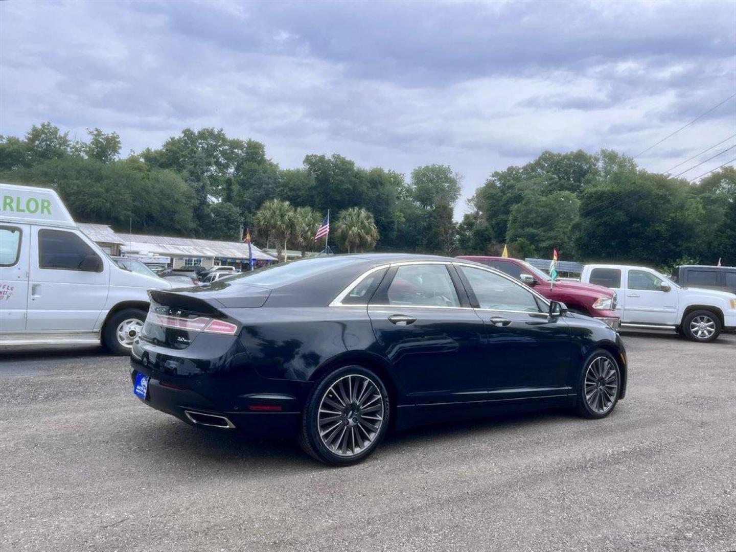 2014 Black /Taupe Lincoln MKZ (3LN6L2G93ER) with an 2.0l I-4 DI T/C Ecoboost engine, Automatic transmission, located at 745 East Steele Rd., West Columbia, SC, 29170, (803) 755-9148, 33.927212, -81.148483 - Special Internet Price! 2014 Lincoln MKZ with AM/FM radio, Bluetooth for phone, Navigation, Cruise control, Sunroof, Keyless entry, Push to start, Leather interior, Powered windows, Powered door locks, Plus more! - Photo#3