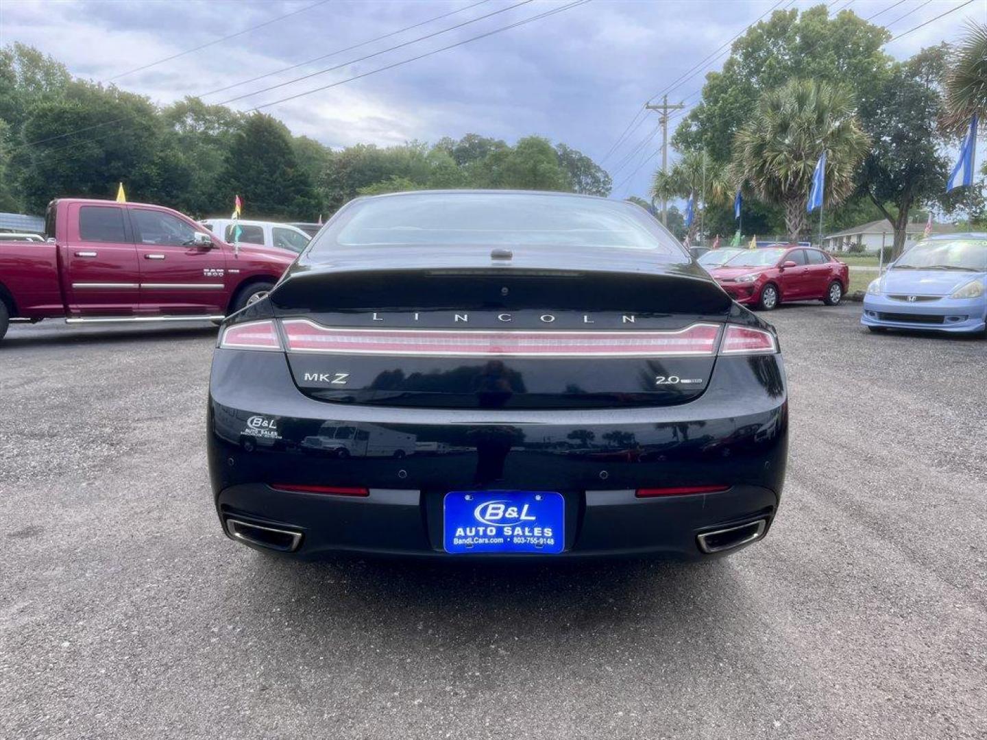 2014 Black /Taupe Lincoln MKZ (3LN6L2G93ER) with an 2.0l I-4 DI T/C Ecoboost engine, Automatic transmission, located at 745 East Steele Rd., West Columbia, SC, 29170, (803) 755-9148, 33.927212, -81.148483 - Special Internet Price! 2014 Lincoln MKZ with AM/FM radio, Bluetooth for phone, Navigation, Cruise control, Sunroof, Keyless entry, Push to start, Leather interior, Powered windows, Powered door locks, Plus more! - Photo#4