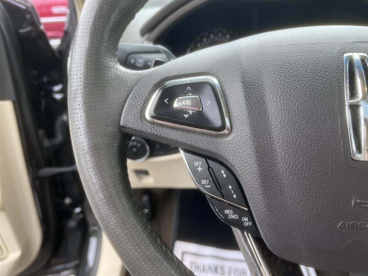 2014 Black /Taupe Lincoln MKZ (3LN6L2G93ER) with an 2.0l I-4 DI T/C Ecoboost engine, Automatic transmission, located at 745 East Steele Rd., West Columbia, SC, 29170, (803) 755-9148, 33.927212, -81.148483 - Special Internet Price! 2014 Lincoln MKZ with AM/FM radio, Bluetooth for phone, Navigation, Cruise control, Sunroof, Keyless entry, Push to start, Leather interior, Powered windows, Powered door locks, Plus more! - Photo#8