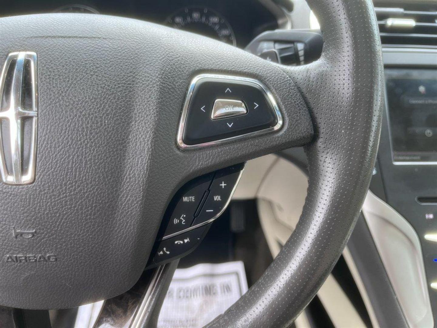 2014 Black /Taupe Lincoln MKZ (3LN6L2G93ER) with an 2.0l I-4 DI T/C Ecoboost engine, Automatic transmission, located at 745 East Steele Rd., West Columbia, SC, 29170, (803) 755-9148, 33.927212, -81.148483 - Special Internet Price! 2014 Lincoln MKZ with AM/FM radio, Bluetooth for phone, Navigation, Cruise control, Sunroof, Keyless entry, Push to start, Leather interior, Powered windows, Powered door locks, Plus more! - Photo#9