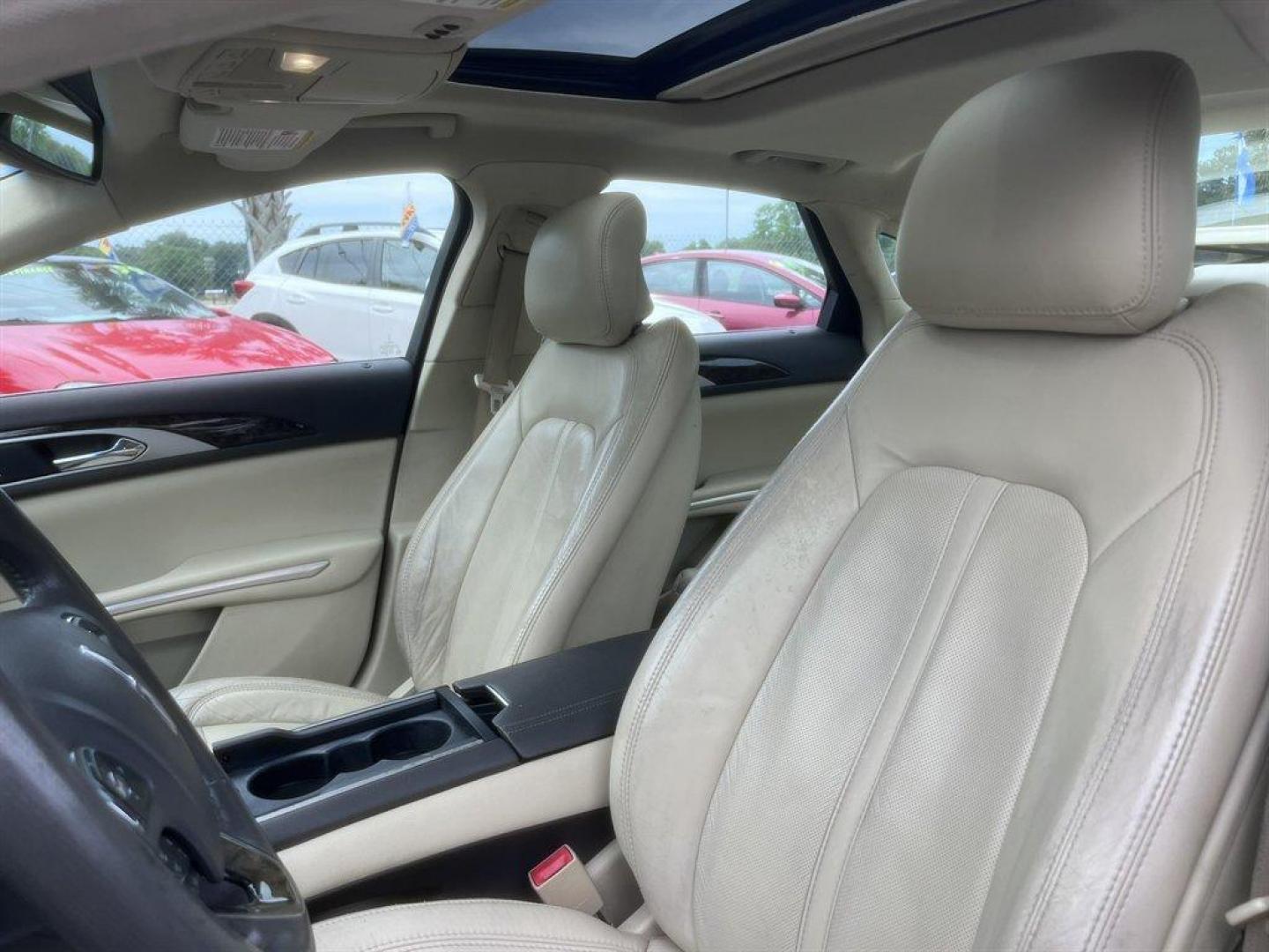 2014 Black /Taupe Lincoln MKZ (3LN6L2G93ER) with an 2.0l I-4 DI T/C Ecoboost engine, Automatic transmission, located at 745 East Steele Rd., West Columbia, SC, 29170, (803) 755-9148, 33.927212, -81.148483 - Special Internet Price! 2014 Lincoln MKZ with AM/FM radio, Bluetooth for phone, Navigation, Cruise control, Sunroof, Keyless entry, Push to start, Leather interior, Powered windows, Powered door locks, Plus more! - Photo#21