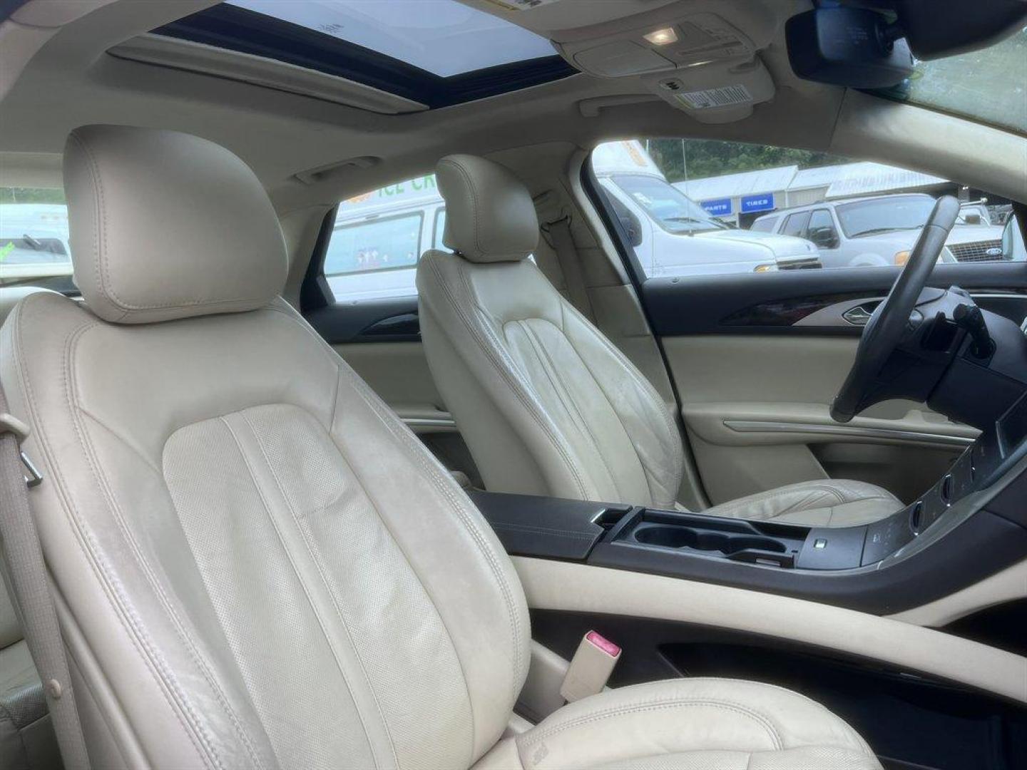 2014 Black /Taupe Lincoln MKZ (3LN6L2G93ER) with an 2.0l I-4 DI T/C Ecoboost engine, Automatic transmission, located at 745 East Steele Rd., West Columbia, SC, 29170, (803) 755-9148, 33.927212, -81.148483 - Special Internet Price! 2014 Lincoln MKZ with AM/FM radio, Bluetooth for phone, Navigation, Cruise control, Sunroof, Keyless entry, Push to start, Leather interior, Powered windows, Powered door locks, Plus more! - Photo#28