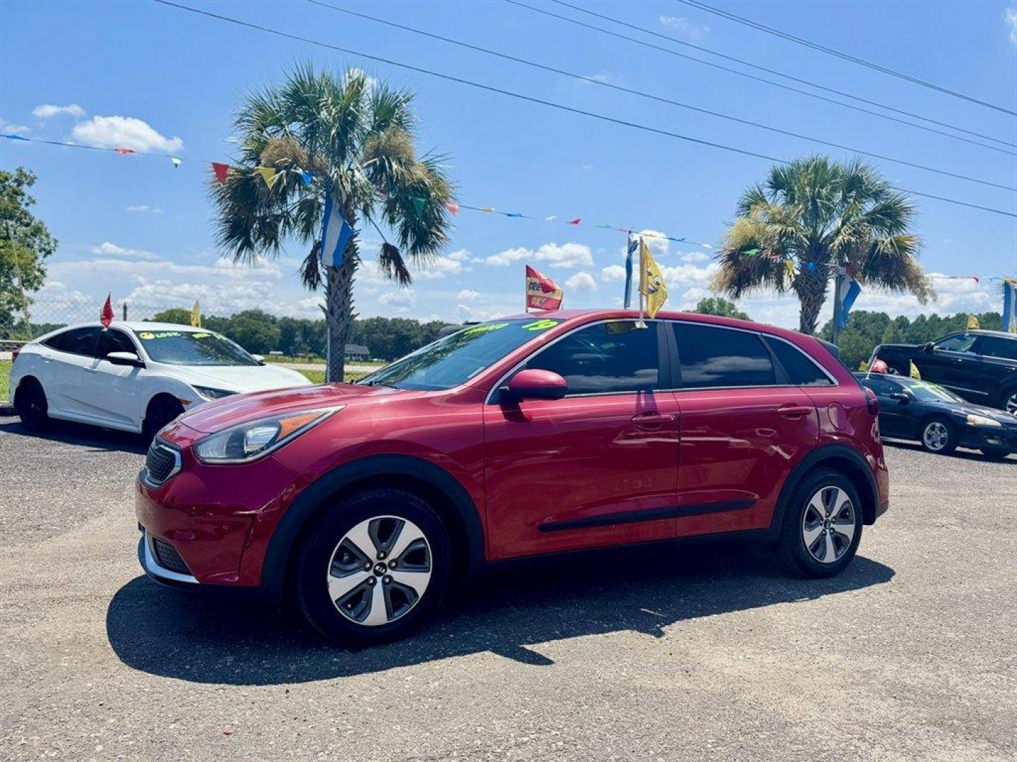 2019 Red /Black Kia Niro (KNDCB3LC2K5) with an 1.6l I-4 DI Dohc Hybrid 1 engine, Automatic transmission, located at 745 East Steele Rd., West Columbia, SC, 29170, (803) 755-9148, 33.927212, -81.148483 - Special Internet Price! 2019 Kia Niro with AM/FM radio, Backup camera, Bluetooth, Cruise control, Cloth interior, Powered windows, Powered door locks, Plus more! - Photo#0