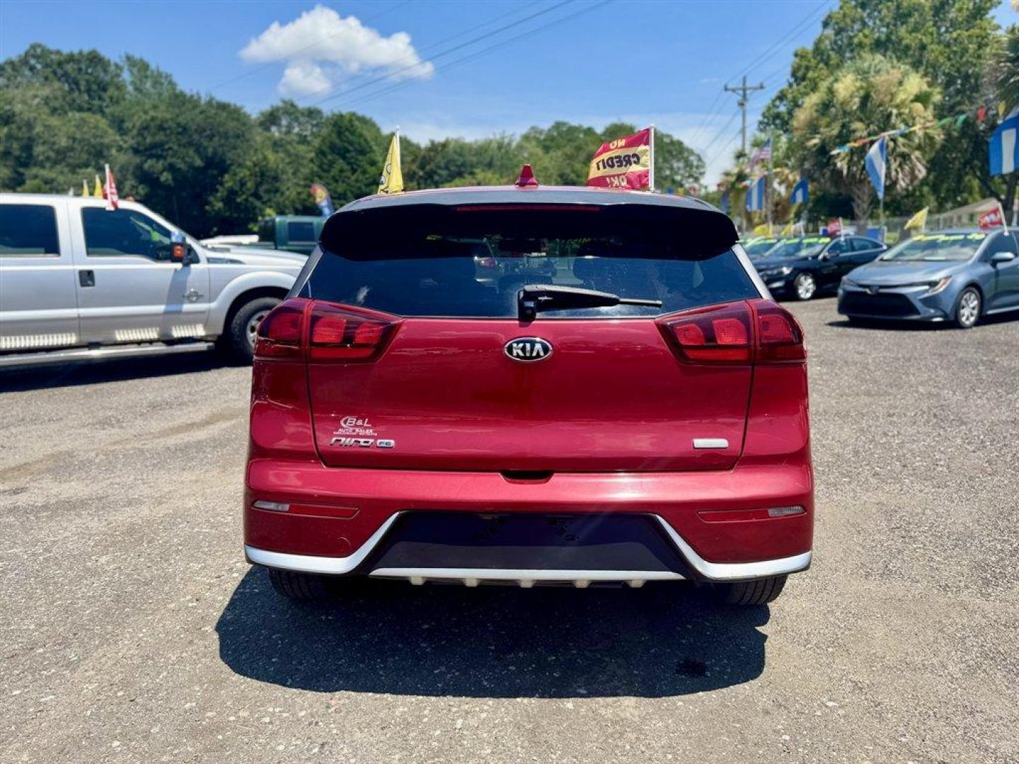 2019 Red /Black Kia Niro (KNDCB3LC2K5) with an 1.6l I-4 DI Dohc Hybrid 1 engine, Automatic transmission, located at 745 East Steele Rd., West Columbia, SC, 29170, (803) 755-9148, 33.927212, -81.148483 - Special Internet Price! 2019 Kia Niro with AM/FM radio, Backup camera, Bluetooth, Cruise control, Cloth interior, Powered windows, Powered door locks, Plus more! - Photo#4
