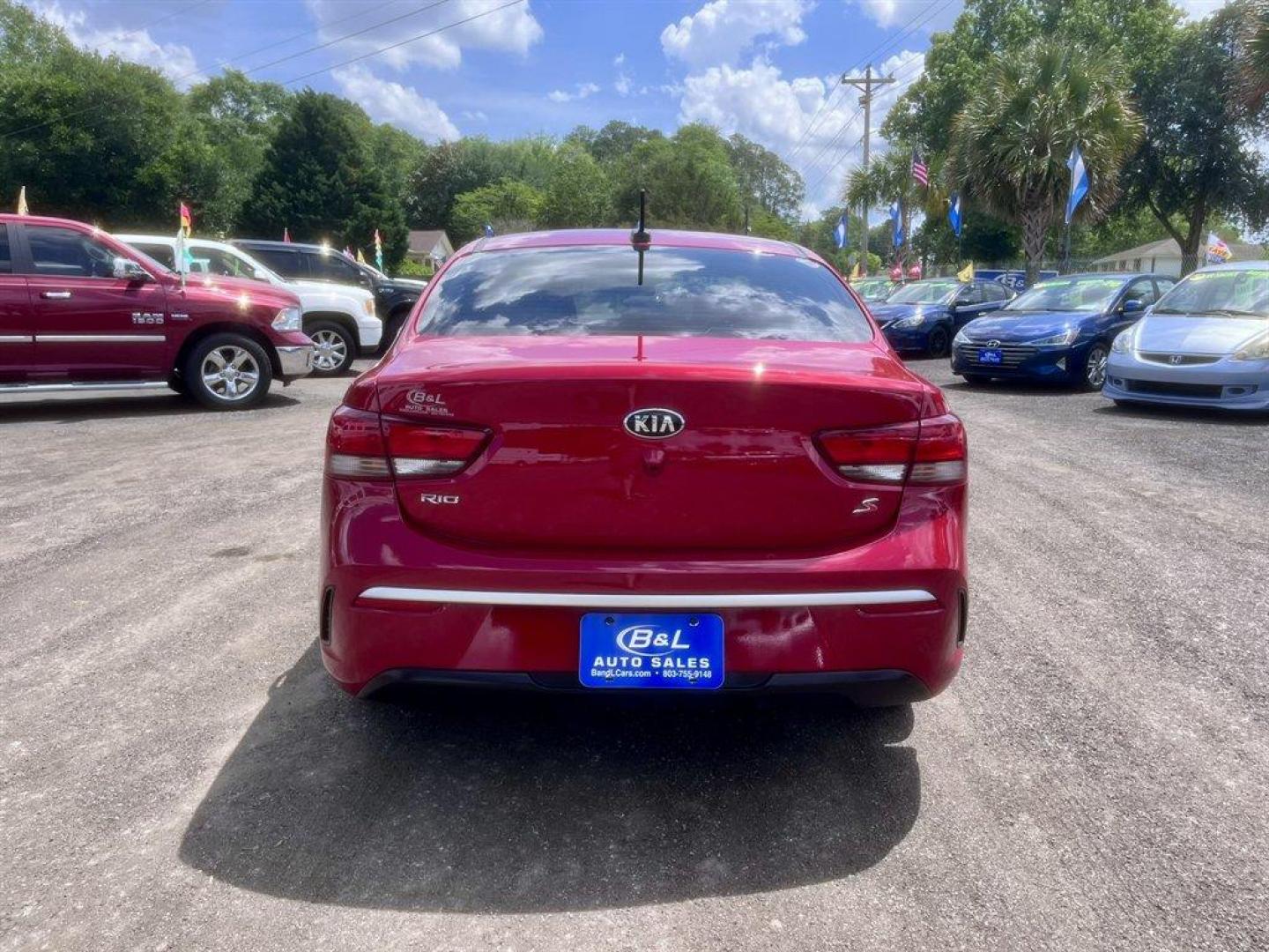 2021 Red /Black Kia Rio (3KPA24ADXME) with an 1.6l I-4 DI Dohc Cvvt 1.6 engine, Automatic transmission, located at 745 East Steele Rd., West Columbia, SC, 29170, (803) 755-9148, 33.927212, -81.148483 - Special Internet Price! 2021 Kia Rio with AM/FM radio, Cruise control, Backup camera, Cloth interior, Powered windows, Powered door locks, Plus more! - Photo#4