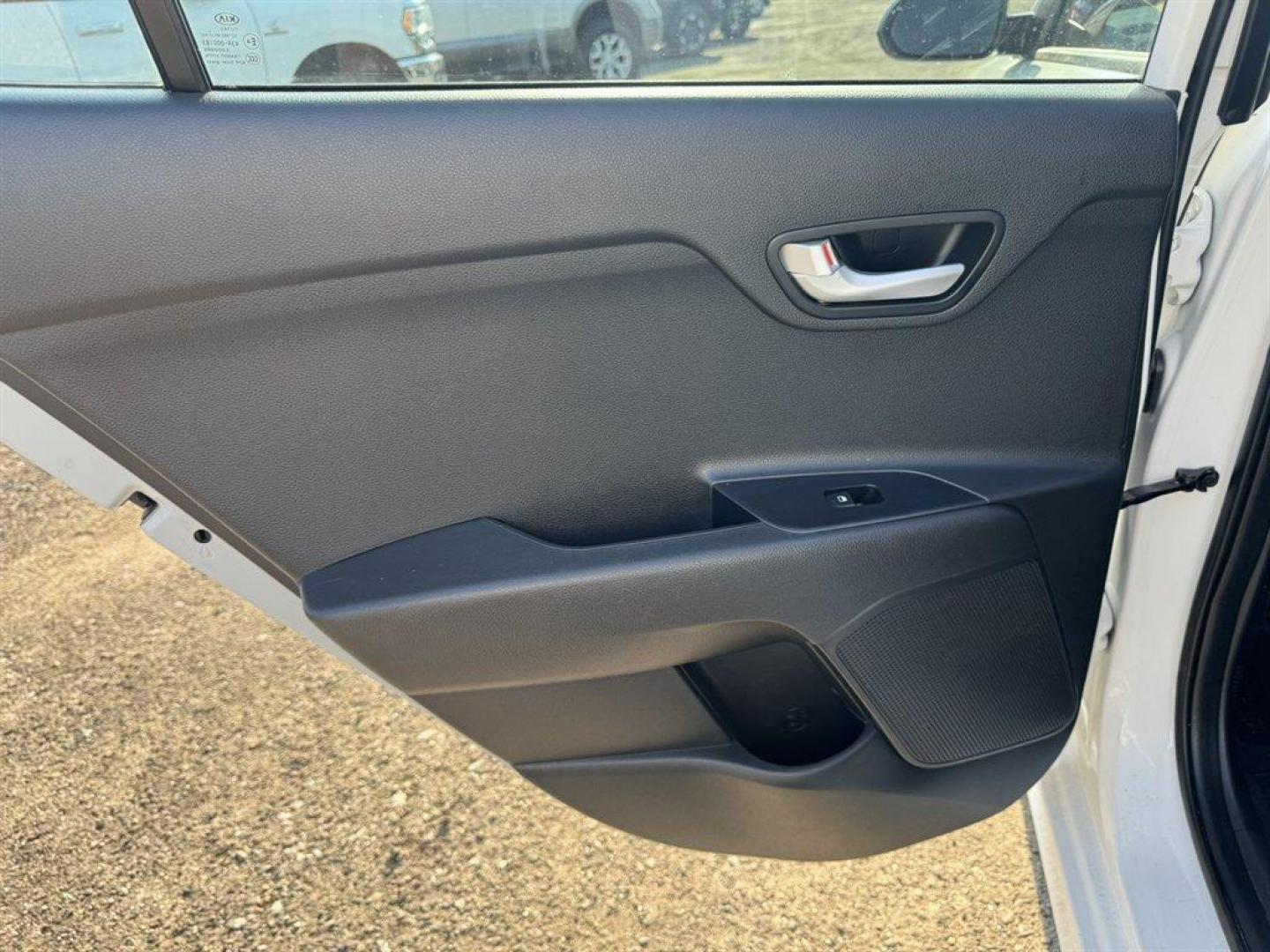 2021 White /Black Kia Rio (3KPA24ADXME) with an 1.6l I-4 DI Dohc Cvvt 1.6 engine, Automatic transmission, located at 745 East Steele Rd., West Columbia, SC, 29170, (803) 755-9148, 33.927212, -81.148483 - Special Internet Price! 2021 Kia Rio with AM/FM radio, Bluetooth, Keyless entry, Cloth interior, Powered windows, Powered door locks, Plus more! - Photo#20