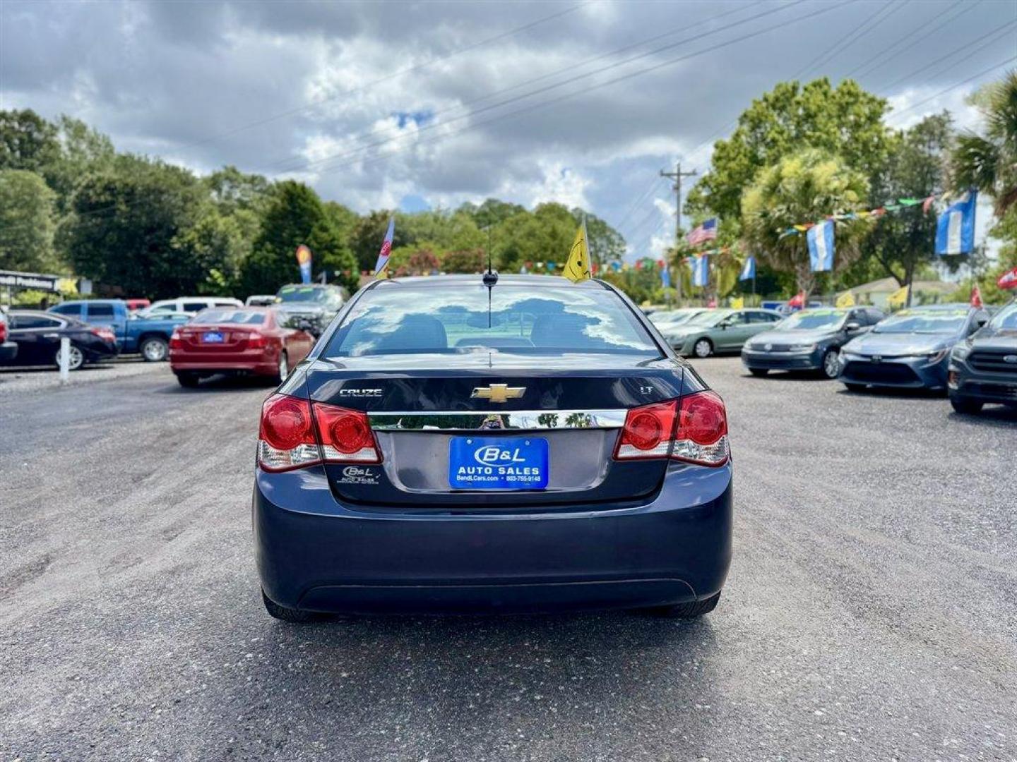 2015 Grey /Black Chevrolet Cruze (1G1PE5SB6F7) with an 1.4l I-4 MFI Dohc T/C 1.4 engine, Automatic transmission, located at 745 East Steele Rd., West Columbia, SC, 29170, (803) 755-9148, 33.927212, -81.148483 - Speacial Internet Price! 2015 Chevrolet Cruze with AM/FM radio, Cruise control, Leather interior, Keyless entry, Powered windows, Powered door locks, Plus more! - Photo#4