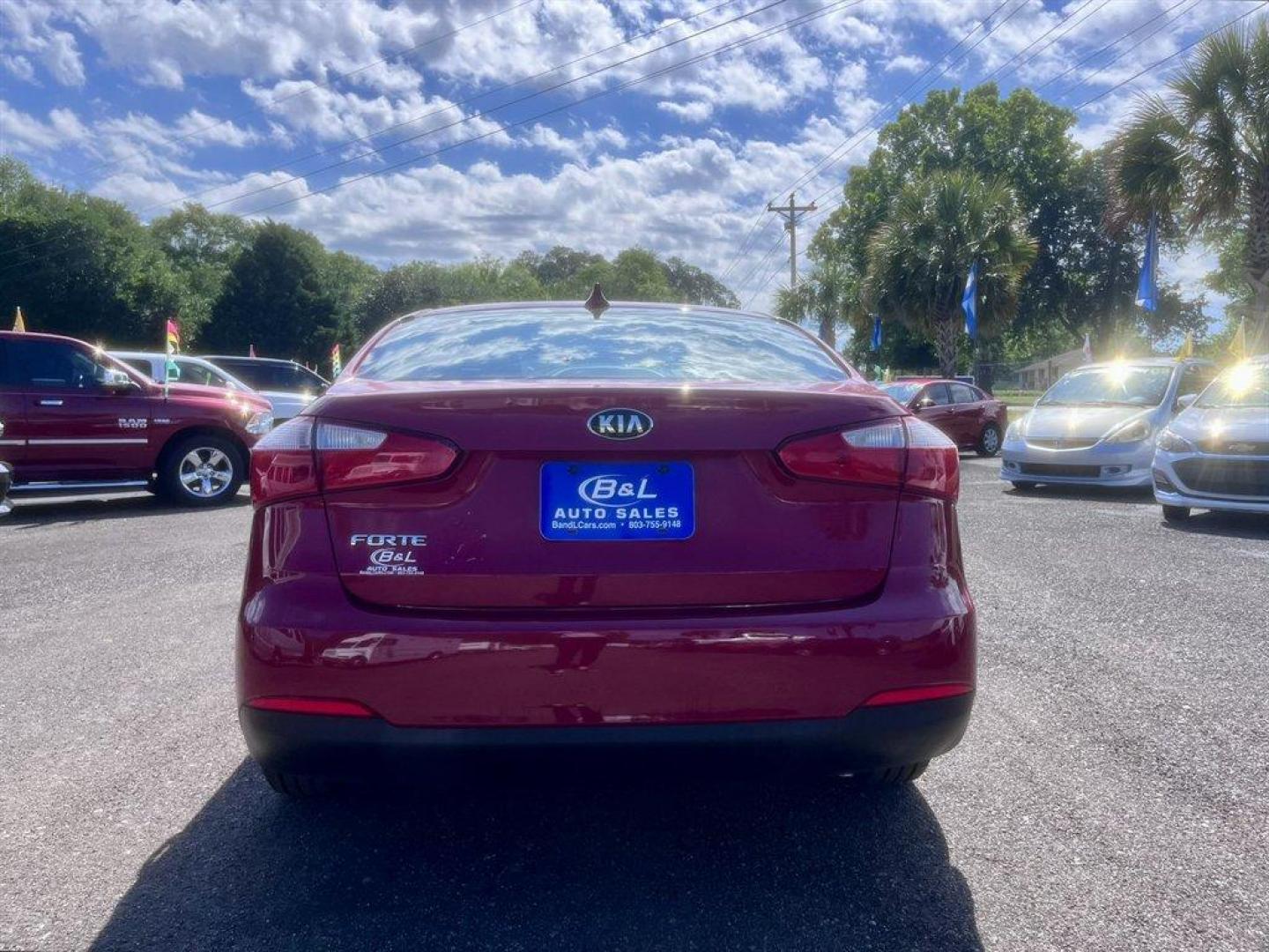 2016 Red /Black Kia Forte (KNAFK4A66G5) with an 1.8l I-4 MPI 1.8l engine, Automatic transmission, located at 745 East Steele Rd., West Columbia, SC, 29170, (803) 755-9148, 33.927212, -81.148483 - Special Internet Price! 2016 Kia Forte with AM/FM radio, Cruise control, Keyless entry, Cloth interior, Powered windows, Powered door locks, Plus more! - Photo#4