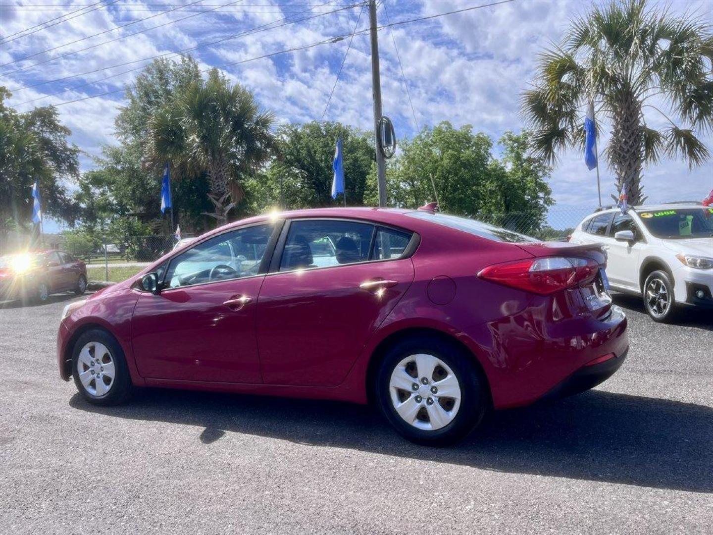 2016 Red /Black Kia Forte (KNAFK4A66G5) with an 1.8l I-4 MPI 1.8l engine, Automatic transmission, located at 745 East Steele Rd., West Columbia, SC, 29170, (803) 755-9148, 33.927212, -81.148483 - Special Internet Price! 2016 Kia Forte with AM/FM radio, Cruise control, Keyless entry, Cloth interior, Powered windows, Powered door locks, Plus more! - Photo#5