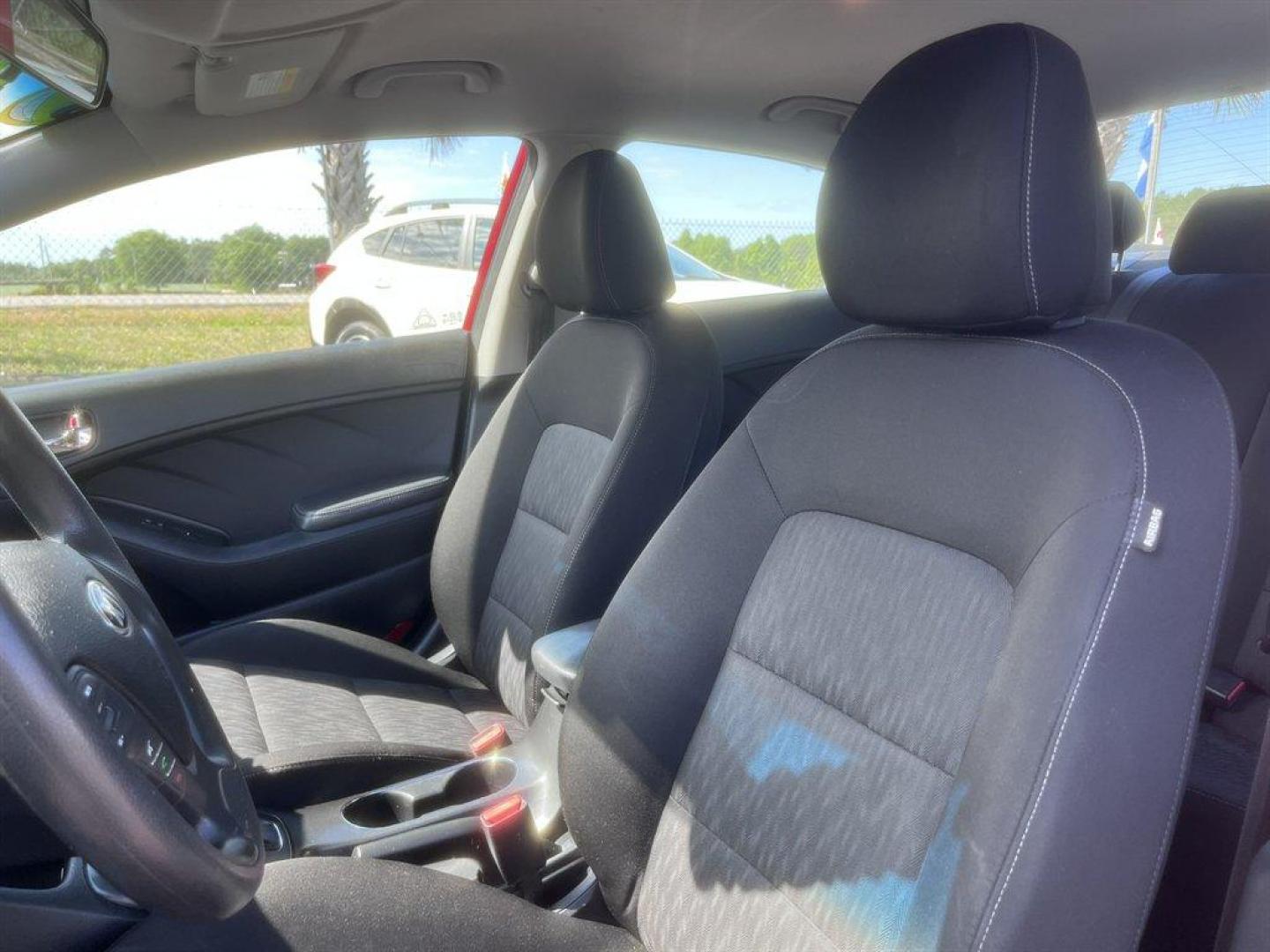 2016 Red /Black Kia Forte (KNAFK4A66G5) with an 1.8l I-4 MPI 1.8l engine, Automatic transmission, located at 745 East Steele Rd., West Columbia, SC, 29170, (803) 755-9148, 33.927212, -81.148483 - Special Internet Price! 2016 Kia Forte with AM/FM radio, Cruise control, Keyless entry, Cloth interior, Powered windows, Powered door locks, Plus more! - Photo#19