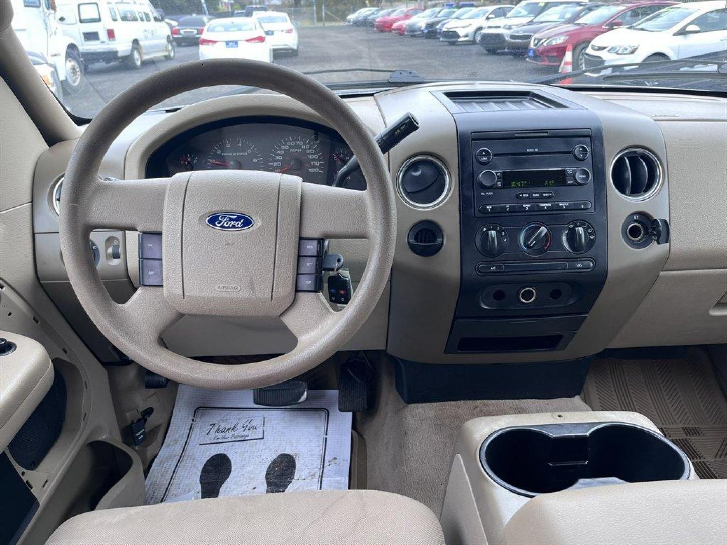 2004 Bronze /Taupe Ford F150 (1FTRW12W94K) with an 4.6l V8 EFI Sohc 4.6l engine, Automatic transmission, located at 745 East Steele Rd., West Columbia, SC, 29170, (803) 755-9148, 33.927212, -81.148483 - Special Internet Price! 2004 Ford F150 with AM/FM radio, Cruise control, Powered driver seat, Cloth interior, Powered door locks, Powered windows, Plus more! - Photo#6