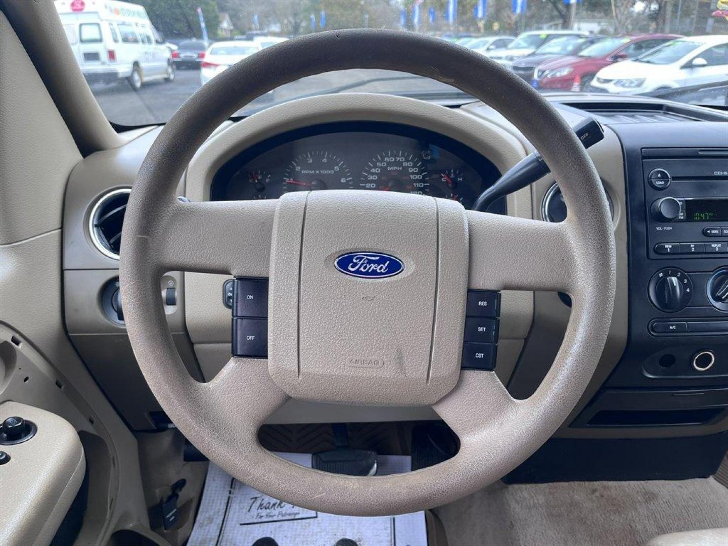 2004 Bronze /Taupe Ford F150 (1FTRW12W94K) with an 4.6l V8 EFI Sohc 4.6l engine, Automatic transmission, located at 745 East Steele Rd., West Columbia, SC, 29170, (803) 755-9148, 33.927212, -81.148483 - Special Internet Price! 2004 Ford F150 with AM/FM radio, Cruise control, Powered driver seat, Cloth interior, Powered door locks, Powered windows, Plus more! - Photo#7