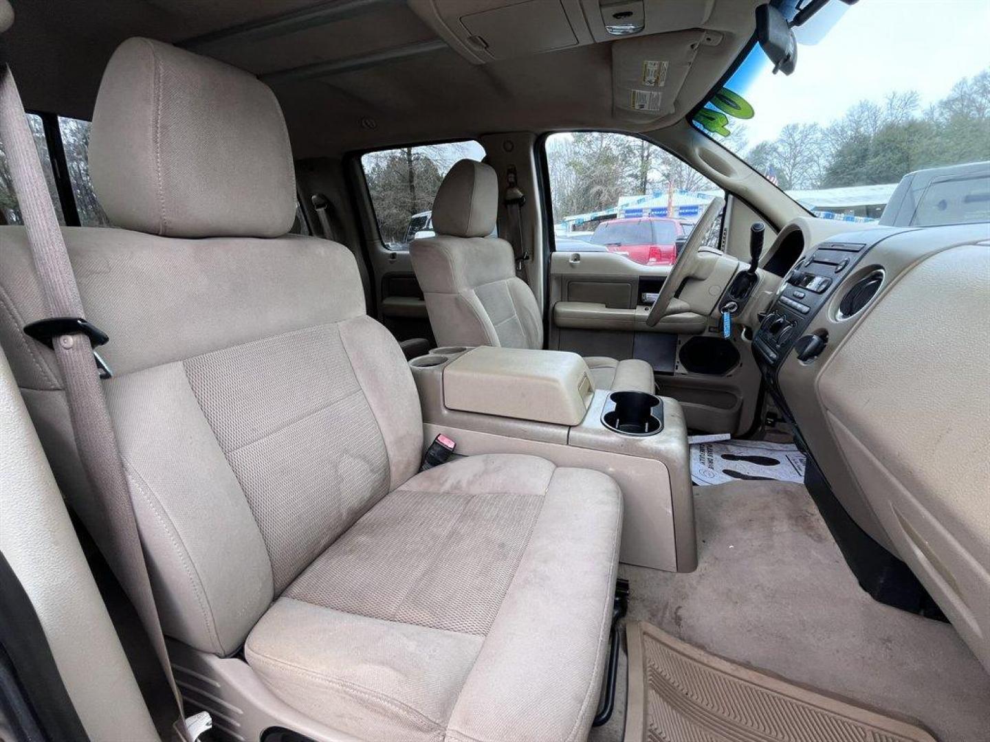 2004 Bronze /Taupe Ford F150 (1FTRW12W94K) with an 4.6l V8 EFI Sohc 4.6l engine, Automatic transmission, located at 745 East Steele Rd., West Columbia, SC, 29170, (803) 755-9148, 33.927212, -81.148483 - Special Internet Price! 2004 Ford F150 with AM/FM radio, Cruise control, Powered driver seat, Cloth interior, Powered door locks, Powered windows, Plus more! - Photo#26