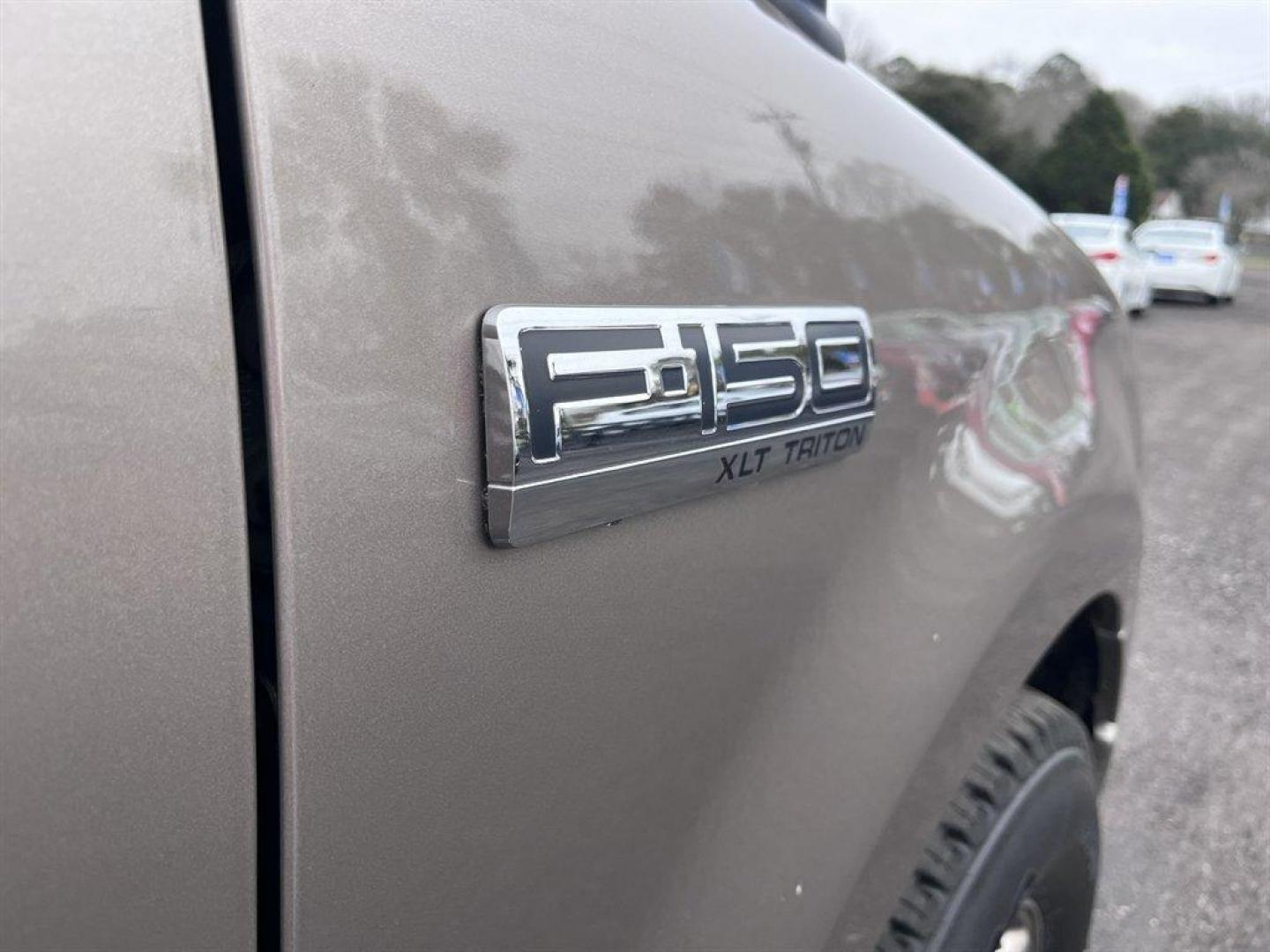 2004 Bronze /Taupe Ford F150 (1FTRW12W94K) with an 4.6l V8 EFI Sohc 4.6l engine, Automatic transmission, located at 745 East Steele Rd., West Columbia, SC, 29170, (803) 755-9148, 33.927212, -81.148483 - Special Internet Price! 2004 Ford F150 with AM/FM radio, Cruise control, Powered driver seat, Cloth interior, Powered door locks, Powered windows, Plus more! - Photo#28