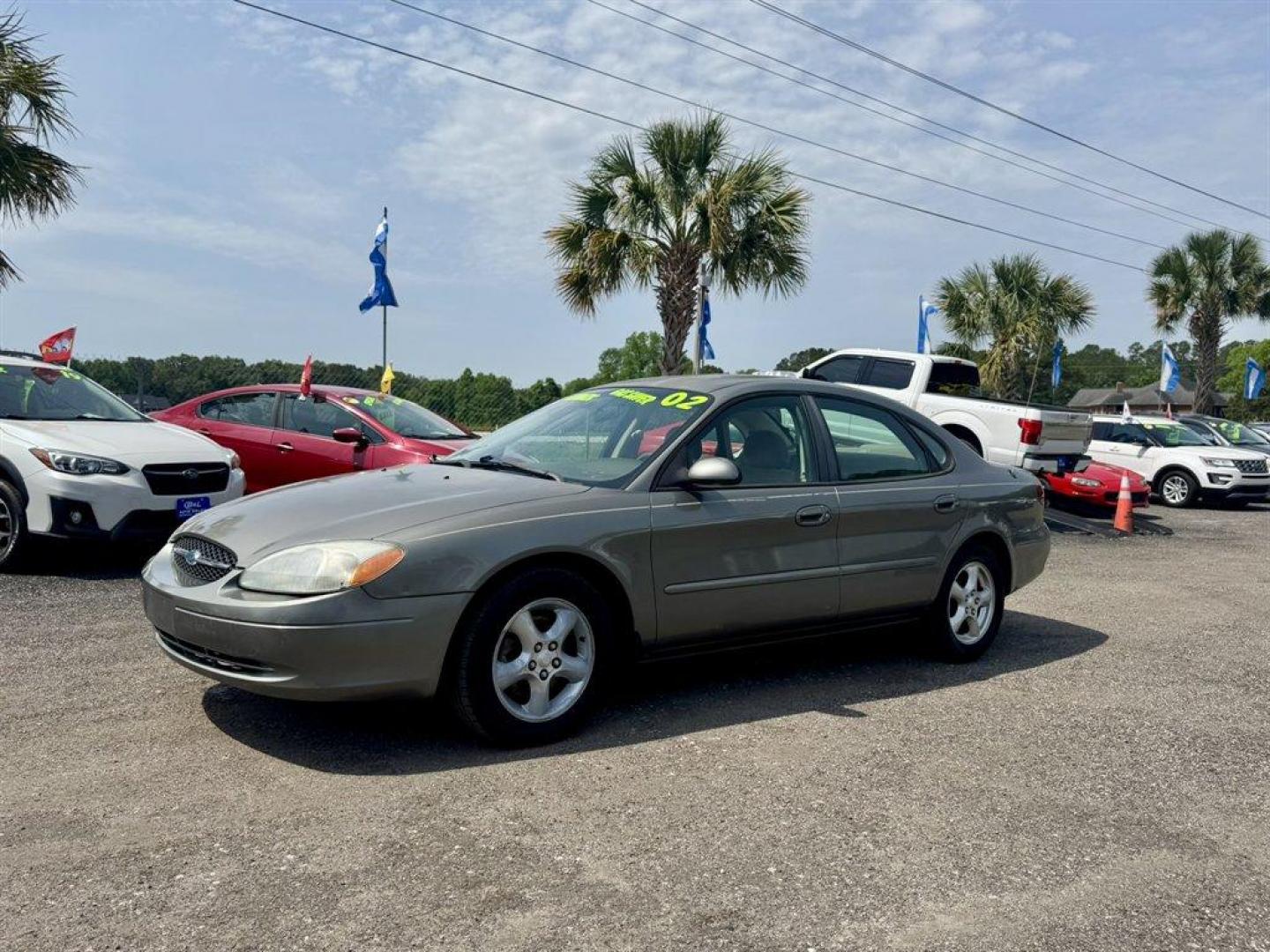 2002 Beige /Taupe Ford Taurus (1FAFP55292A) with an 3.0l V6 EFI Flex Fuel 3.0 engine, Automatic transmission, located at 745 East Steele Rd., West Columbia, SC, 29170, (803) 755-9148, 33.927212, -81.148483 - Special Internet Price! 2002 Ford Taurus - Photo#0