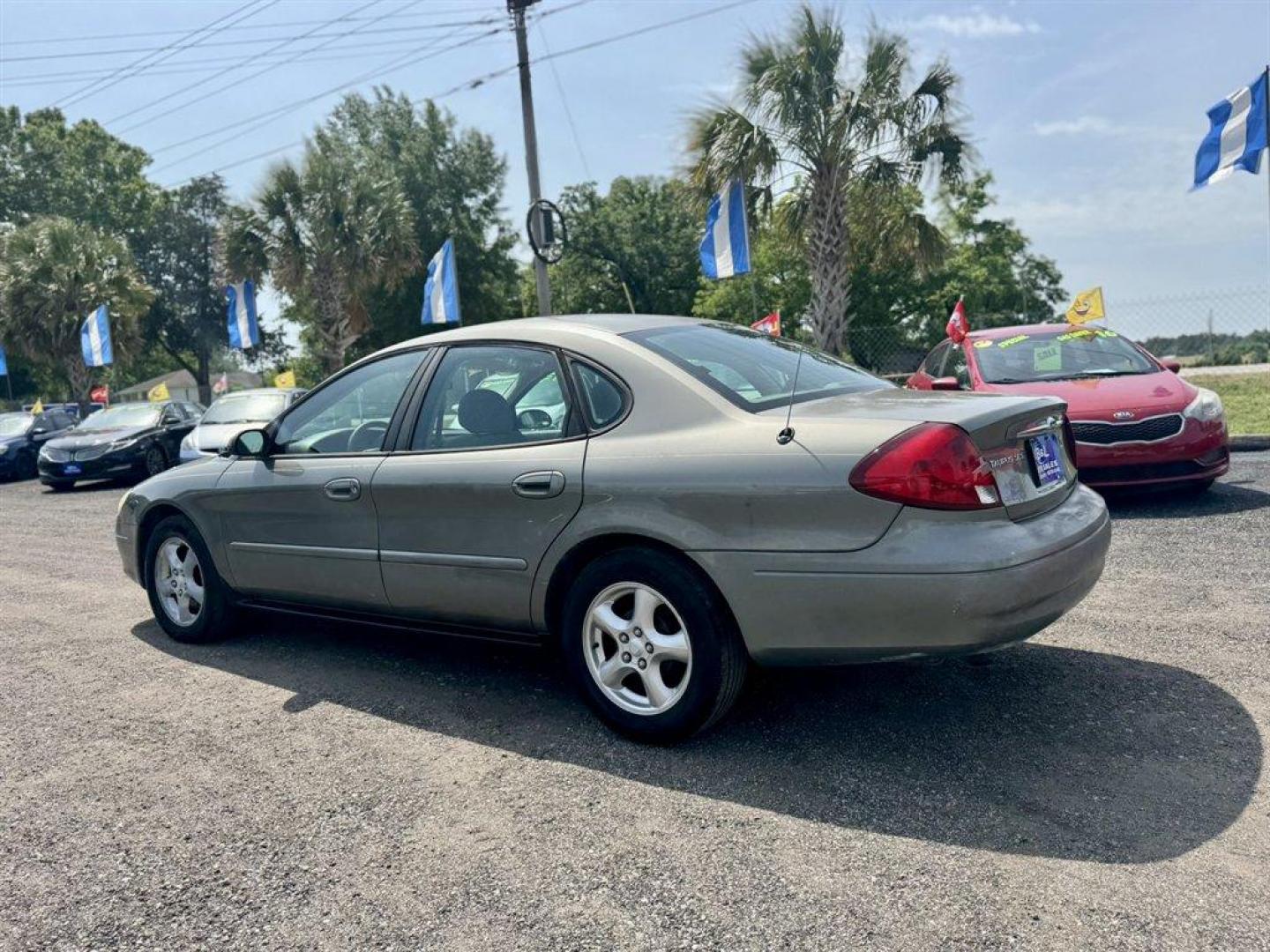 2002 Beige /Taupe Ford Taurus (1FAFP55292A) with an 3.0l V6 EFI Flex Fuel 3.0 engine, Automatic transmission, located at 745 East Steele Rd., West Columbia, SC, 29170, (803) 755-9148, 33.927212, -81.148483 - Special Internet Price! 2002 Ford Taurus - Photo#5