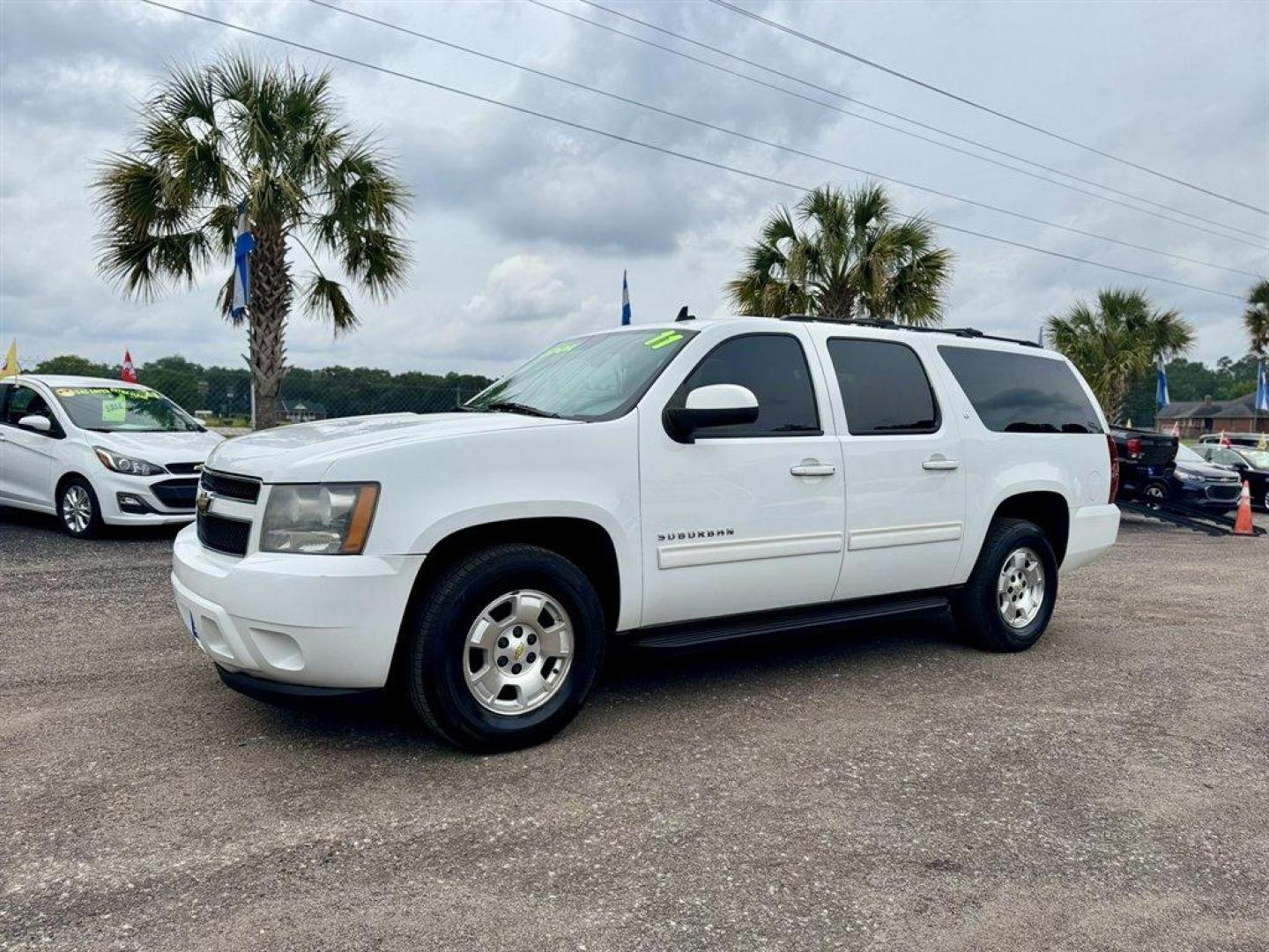 2011 White /Grey Chevrolet Suburban (1GNSCJE0XBR) with an 5.3l V8 SFI 5.3l engine, Automatic transmission, located at 745 East Steele Rd., West Columbia, SC, 29170, (803) 755-9148, 33.927212, -81.148483 - Special Internet Price! 2011 Chevrolet Suburban LT with AM/FM radio, Backup camera, Cruise control, Leather interior, 3rd seating, Seats up to 8, Powered windows, Powered door locks, Plus more! - Photo#0
