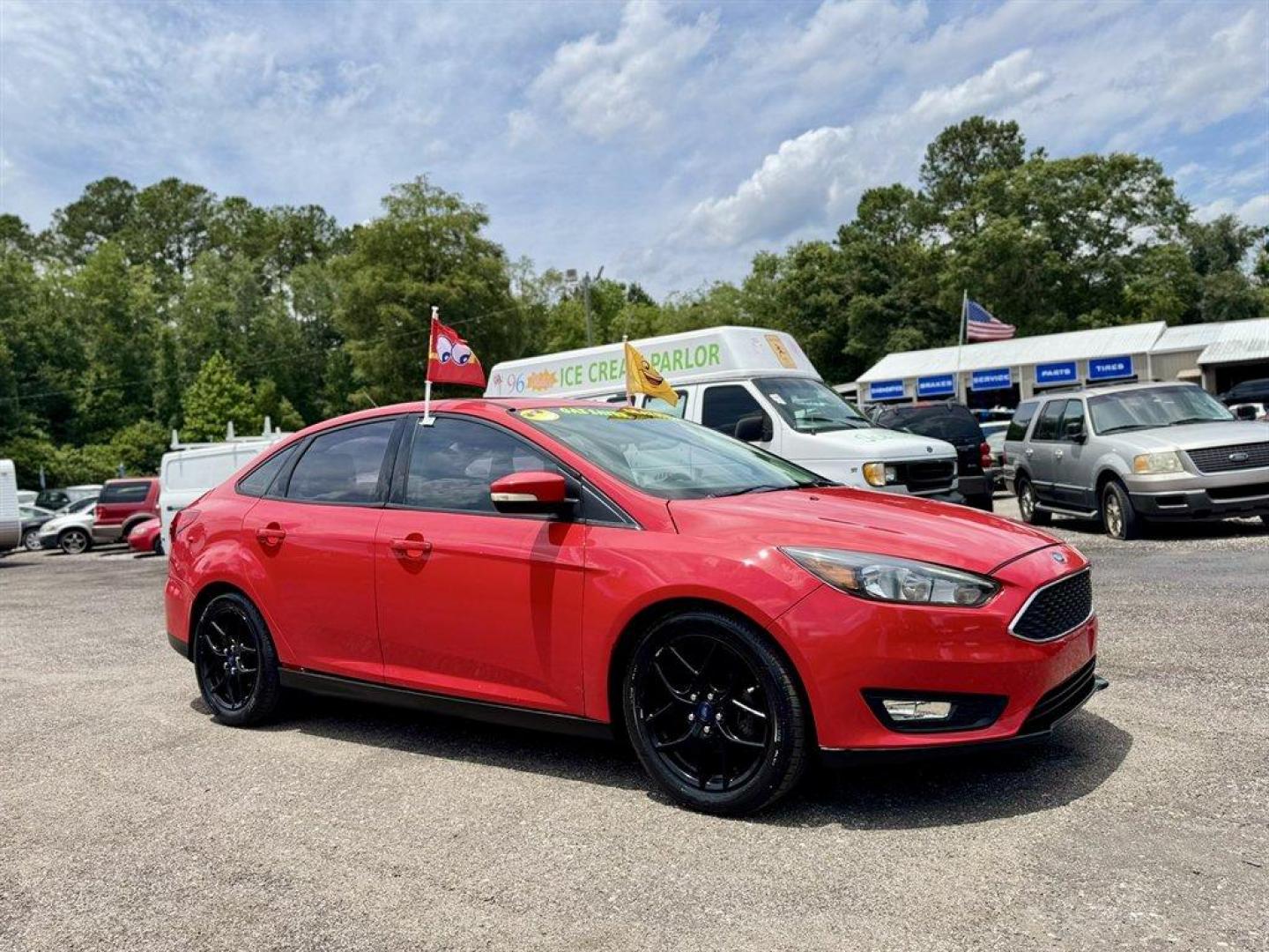 2016 Red /Black Ford Focus (1FADP3F24GL) with an 2.0l I-4 DI Dohc Flex 2.0 engine, Automatic transmission, located at 745 East Steele Rd., West Columbia, SC, 29170, (803) 755-9148, 33.927212, -81.148483 - Special Internet Price! 2016 Ford Focus with AM/FM radio, Backup camera, Navigation, Cruise control, Sunroof, Leather interior, Powered driver seat, Powered windows, Powered door locks, Plus more! - Photo#2